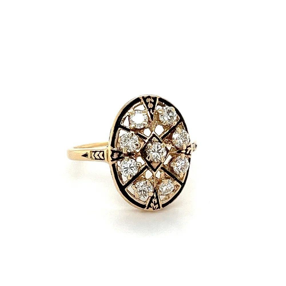 Simply Beautiful! Vintage Victorian Revival Diamond and Black Enamel Gold Cluster Ring. Hand set with Diamonds, weighing approx. 0.74tcw. The central black enamel adds a hint of richness and elegance. The ring is Hand crafted in 14K Yellow Gold.
