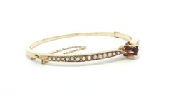 Vintage Victorian Revival Yellow Gold Garnet Seed Pearl Open Bangle Bracelet