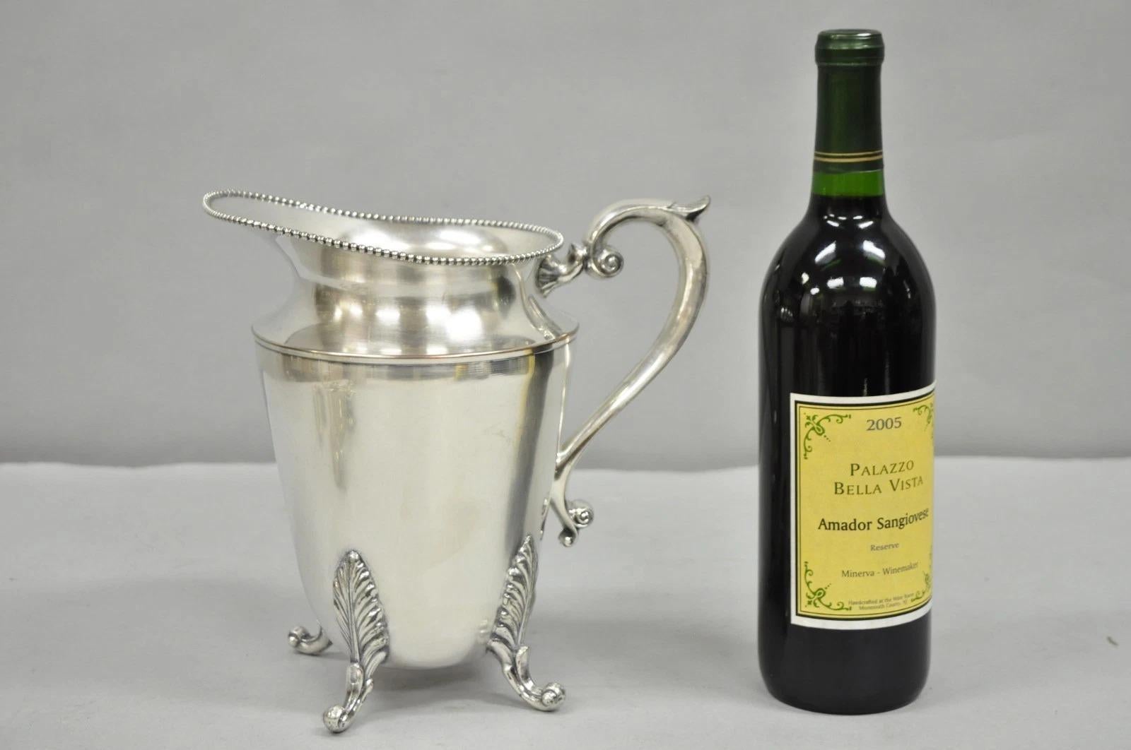 Vintage Victorian Silver Plated Bulbous Footed Water Pitcher w/ Handle. Circa Mid 20th Century. Measurements: 8.5