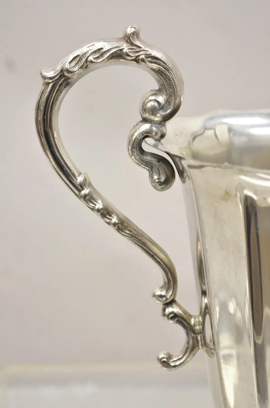 Vintage Victorian Silver Plated Fluted Paw Feet Footed Water Beverage Pitcher In Good Condition For Sale In Philadelphia, PA