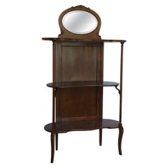 Librería de caoba de estilo victoriano vintage o soporte de almacenaje para la entrada