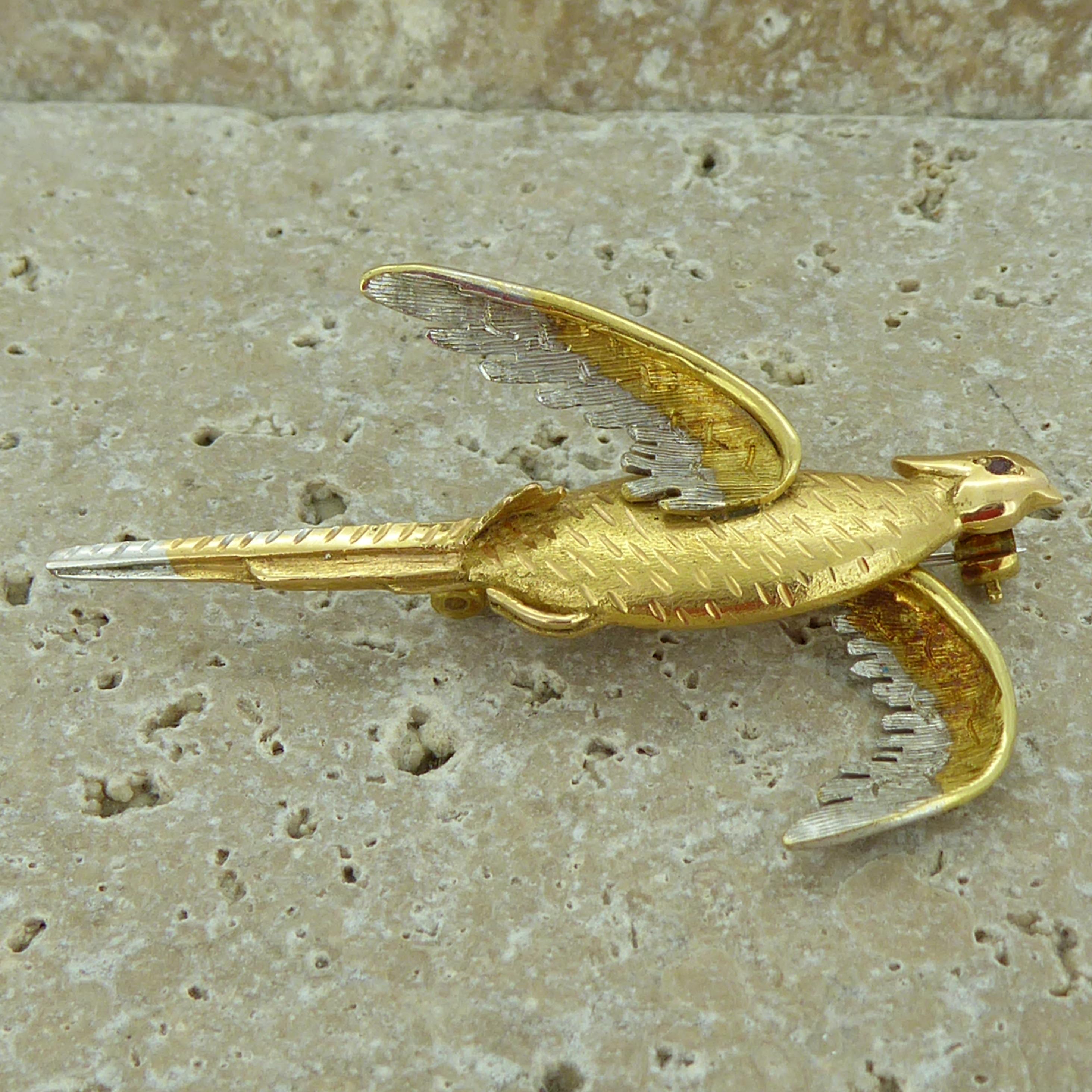 Sporting jewellery was a popular theme in the Victorian era and this is a finely crafted modern sporting brooch depicting a pheasant in flight.  The main body of the pheasant is in 18ct yellow gold with white gold used as an accent on the underside