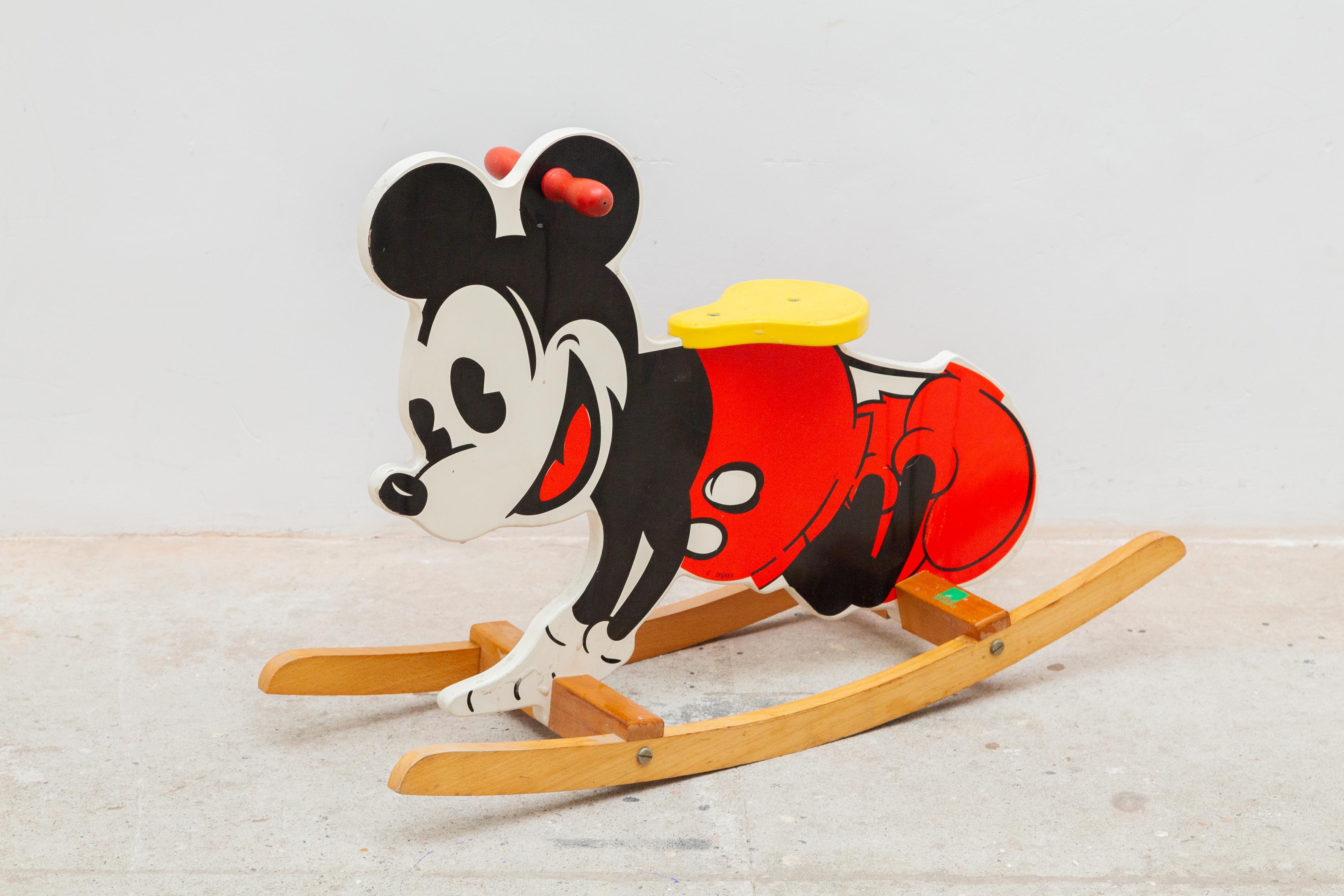 Vintage 1980's Mickey Mouse Rocking Horse made all of wood, This is a Vilac France Disney Mickey Mouse rocker wooden toy.
The original Vilac Made in France label is attached to the bottom of the toy. In original good condition.