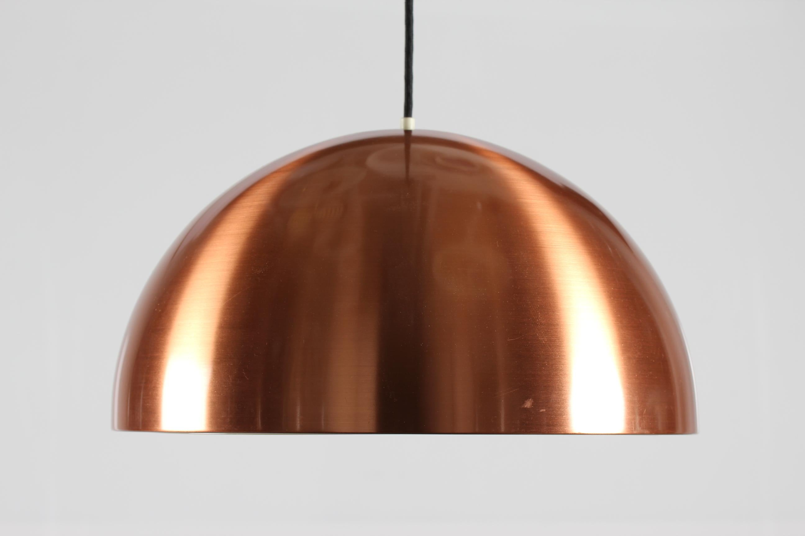This pendant lamp model Louisiana is designed by the Danish designers Vilhelm Wohlert and Jørgen Bo in 1967 and produced by the Danish lamp manufacturer Louis Poulsen A/S in the late 1960s. The lamp is made of copper with white lacquer inside and