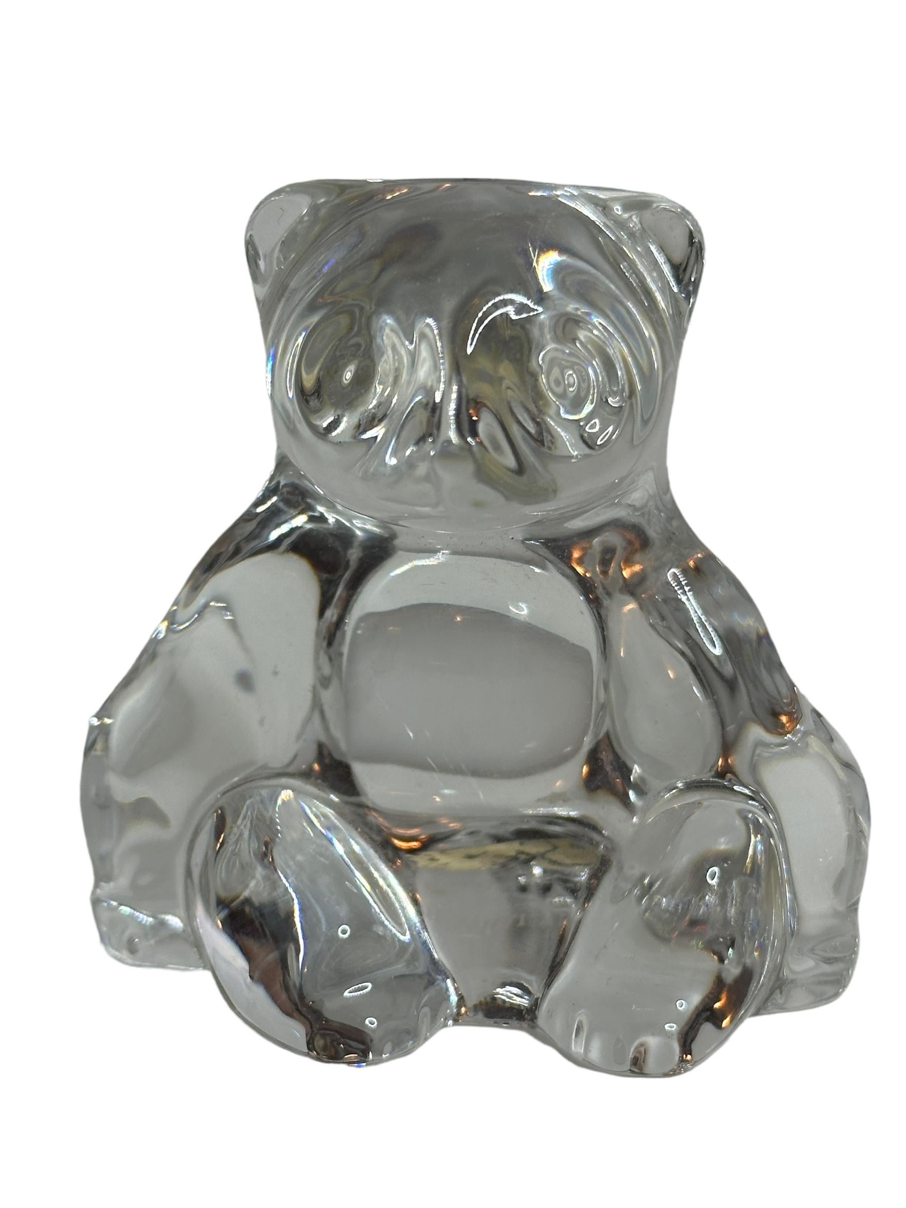 This vintage Villeroy & Boch paperweight features a delightful sitting panda bear design. The clear glass material is cut-to-clear and gives the paperweight a charming cuddly appearance. This modern original is a perfect addition to any collection