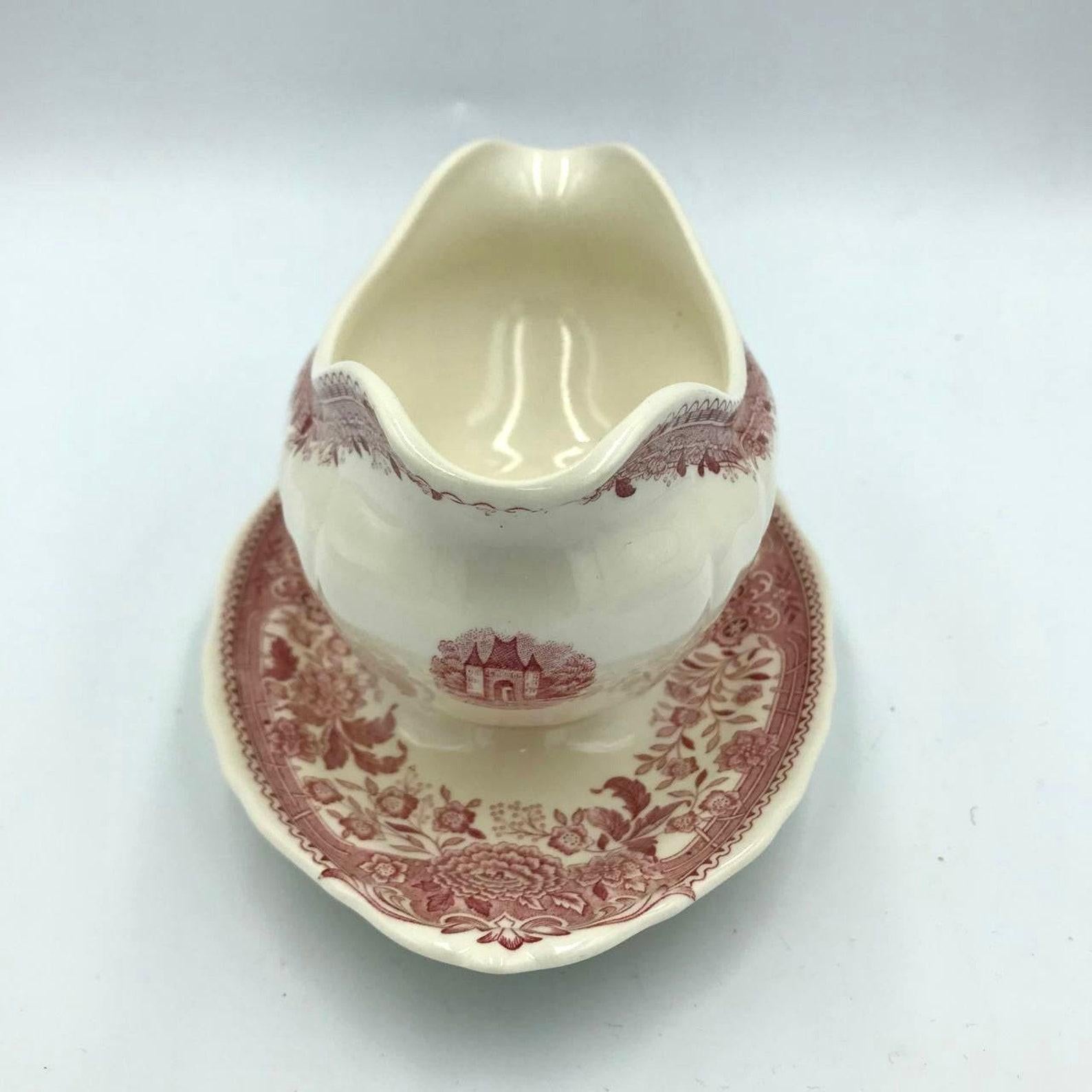 Sauce Bowl with Fixed Bottom Dish.
 Made by Villeroy & Boch decorated with the ‘Burgenland’ pattern in red.

This Red Burgenland Sauce Bowl is out off production. 

Burgenland is one of Villeroy & Boch’s most iconic patterns.

It was produced from