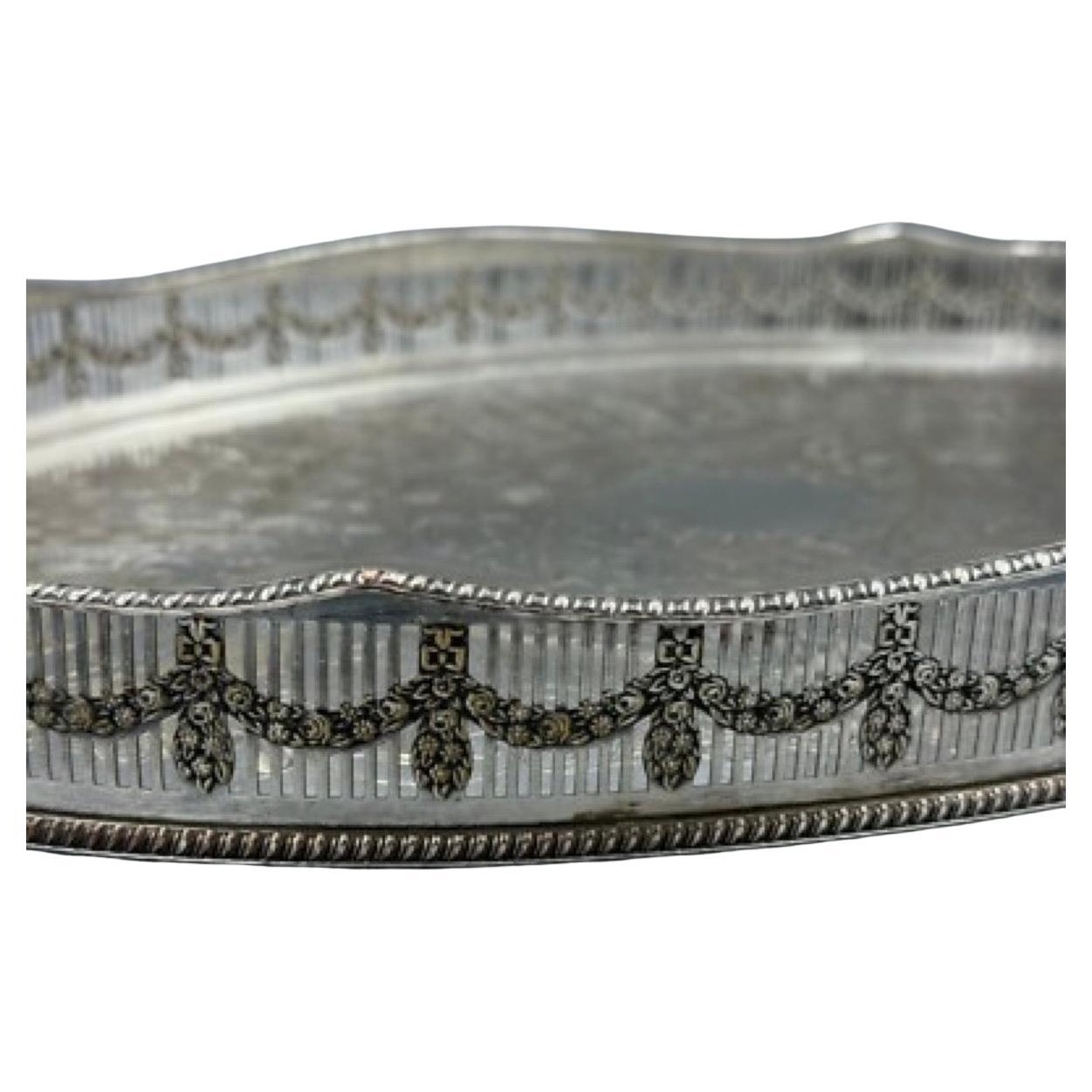 A wonderfully charming and elegant small vintage Viners Alpher Silver Plated Gallery Serving Tray. Use it for an intimate 2 person occasion or center piece for your special table.
This oval shaped silver plated serving tray was made in Sheffield