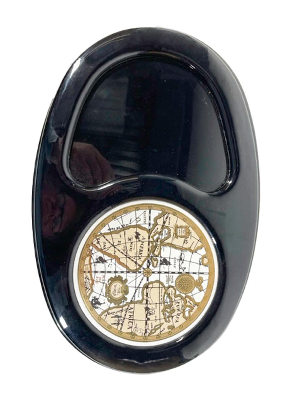 Mid-Century Modern oval cheese board clad in black vinyl with a ceramic tile inset cutting surface mad to compliment the Cera Glassware Old World Map barware pattern, decorated with an antique style world map.

 