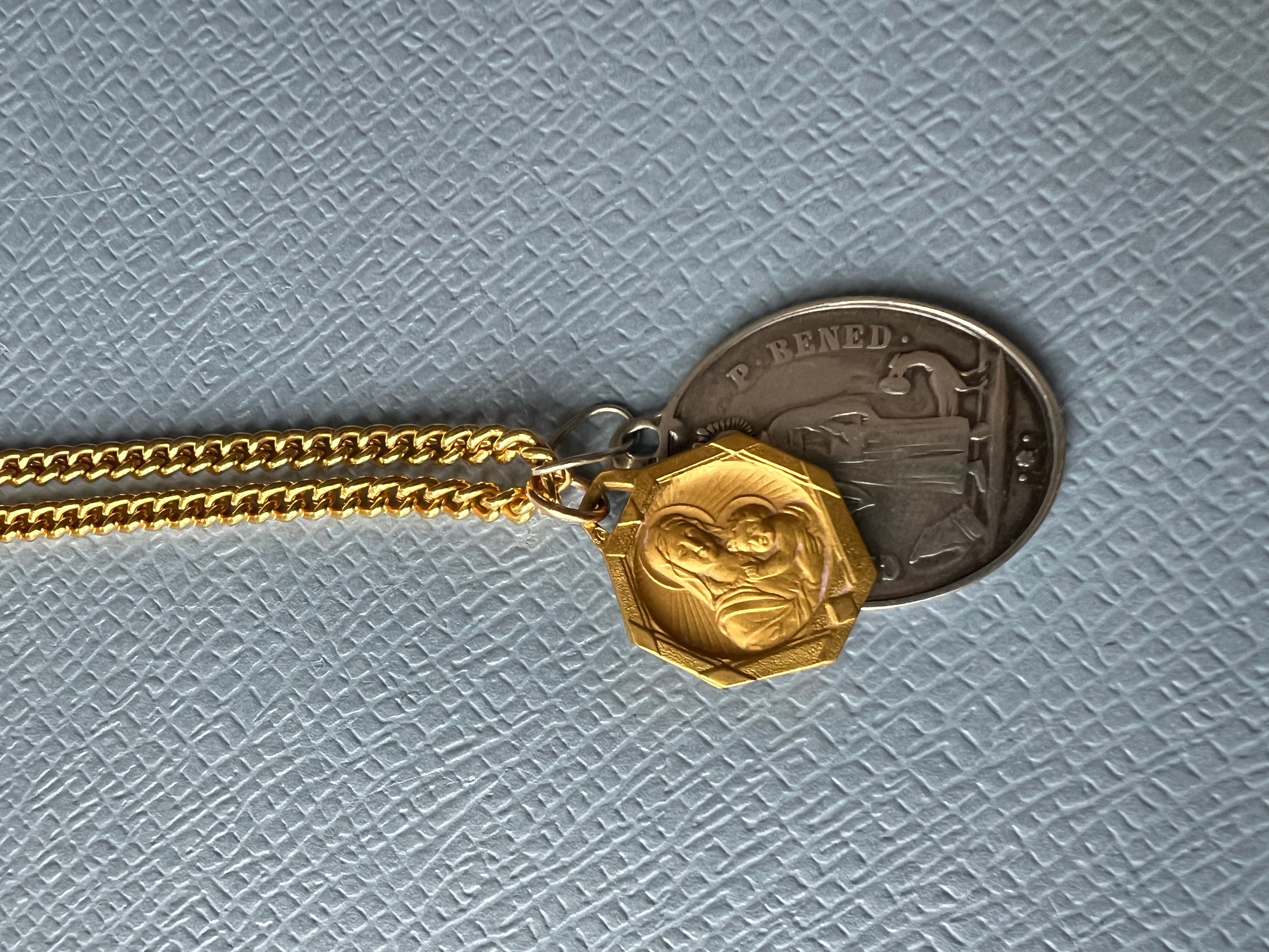 Vintage or Antique  Virgin Mary Medal Gold Plated and a Silver Medal on a long Chain Necklace 

70 cm Long

Designer: J DAUPHIN 

Available for immediate delivery 