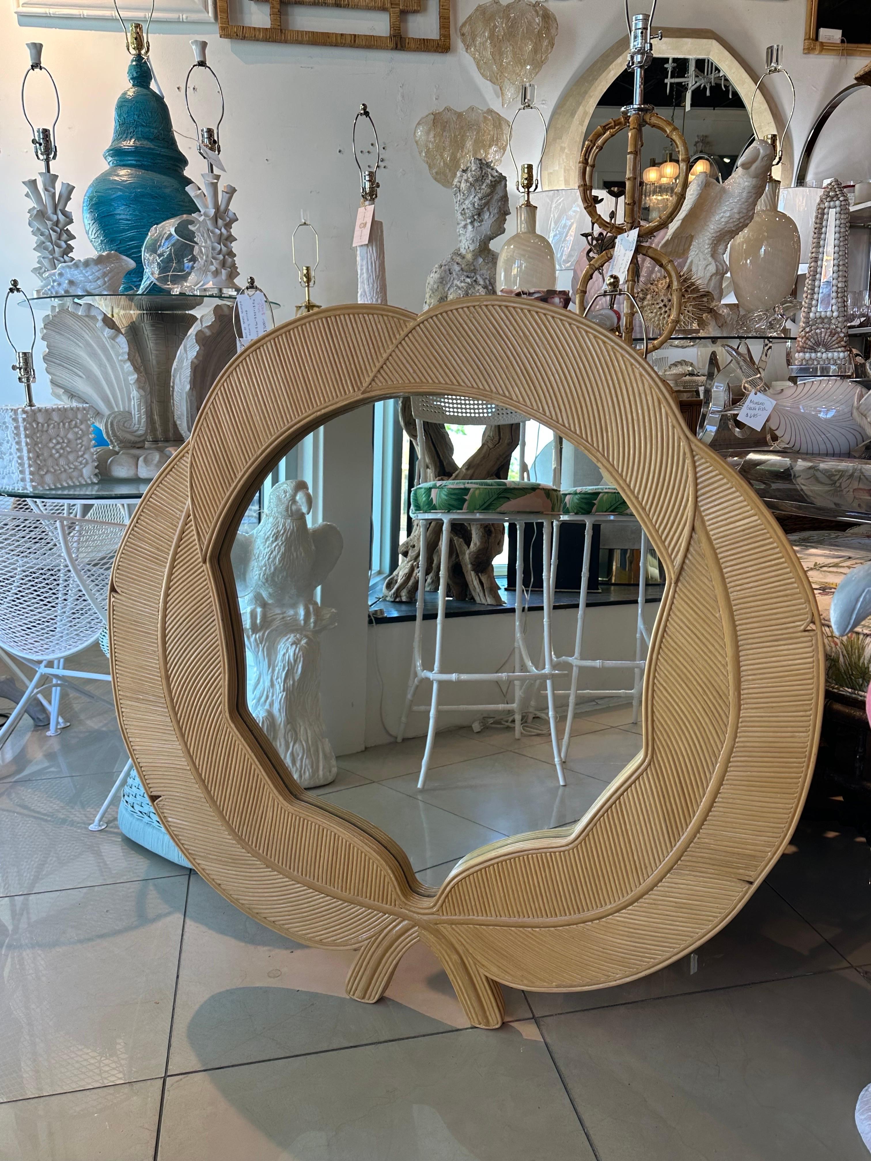 Vintage 1970s Vivai Del Sud Italian wall mirror. Bamboo rattan pencil reed leaf leaves tropical design. Comes ready to hang on your wall. No damage. Dimensions: 39.5 D x 1 D. 