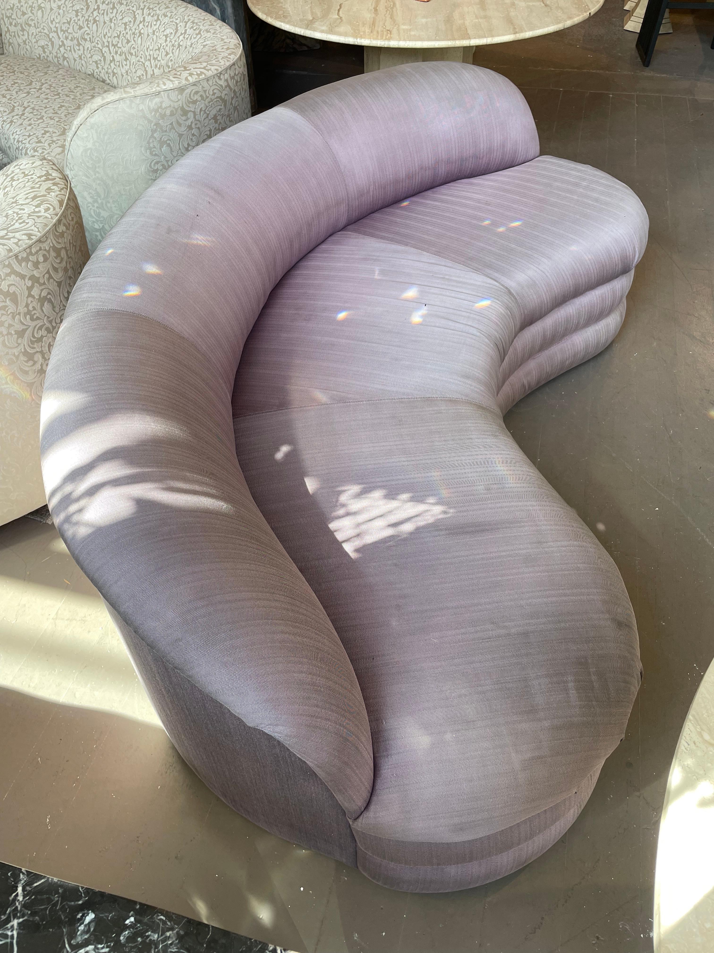 Beautiful and comfortable curved sofa in original lilac silk fabric. Use as a living room or banquet sofa. Lovely!.