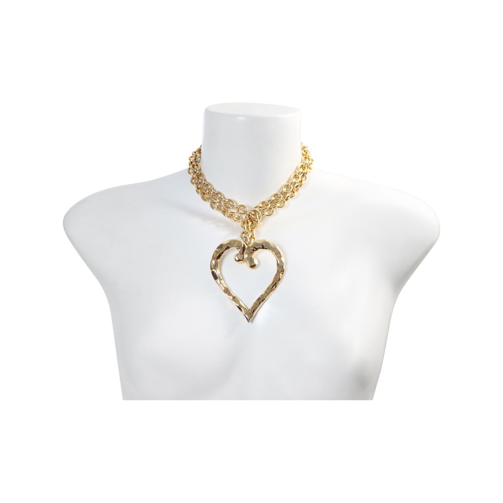 Vintage Vo Gold Tone Link Necklace With Large Heart, Circa 1980s.  This versatile necklace, as shown in the photos, can be worn in different ways.  It can be worn long, around, or doubled around the back of the neck and worn as a lariat style.

 