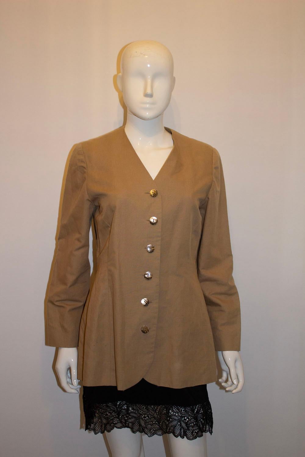 A great vintage jacket for Spring / Summer. This wonderful linen jacket has a v neckline and six button front opening . It is fully  lined. 
Measurements: Bust 37'' , length 29''