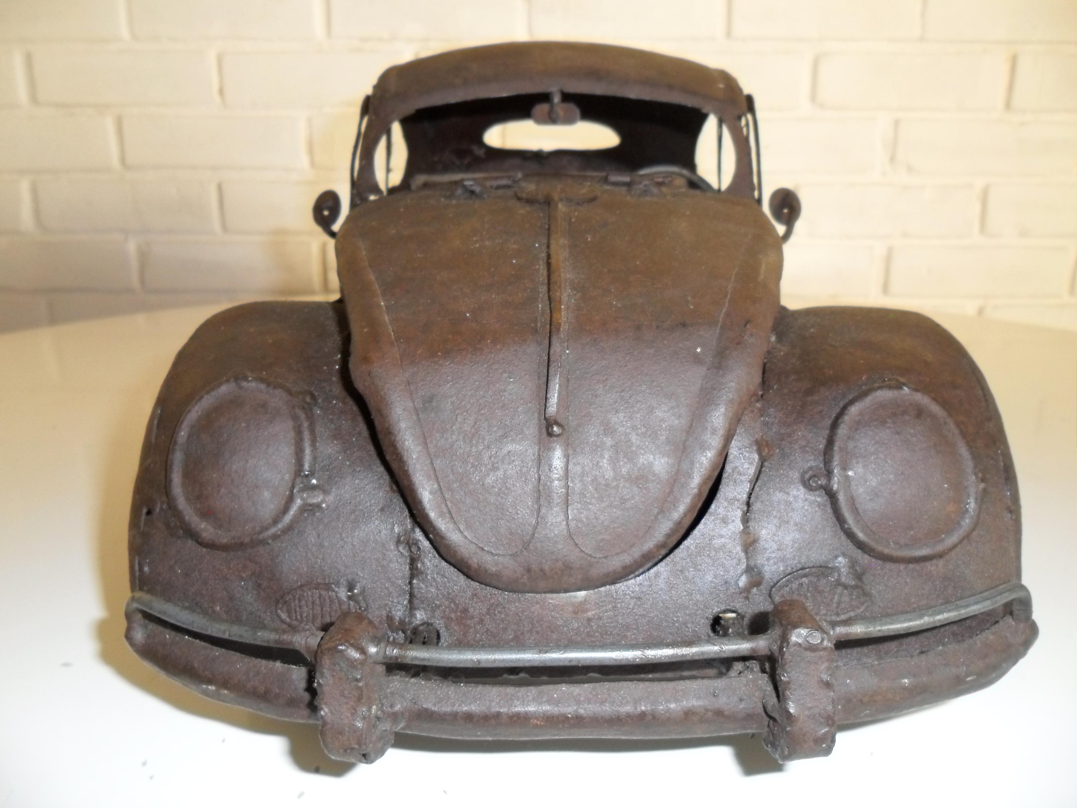 Stunning vintage brutalist VW Beetle Sculpture by Metalsmith Antonio Fortanel.
(The most rare and desirable of his pieces).
Early piece.
Mexico City, circa 1968.
  