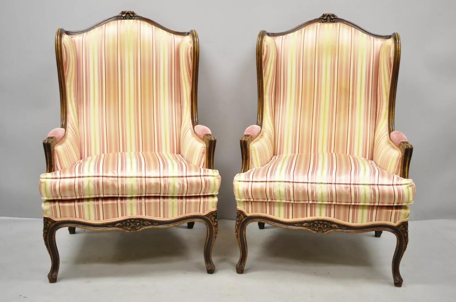 Vintage W & J Sloane French Louis XV Style Wingback Lounge Arm Chairs - a Pair. Item featured are Made in Italy, originally sold by W & J Sloane Inc, solid wood frame, beautiful wood grain, distressed finish, nicely carved details, original label,