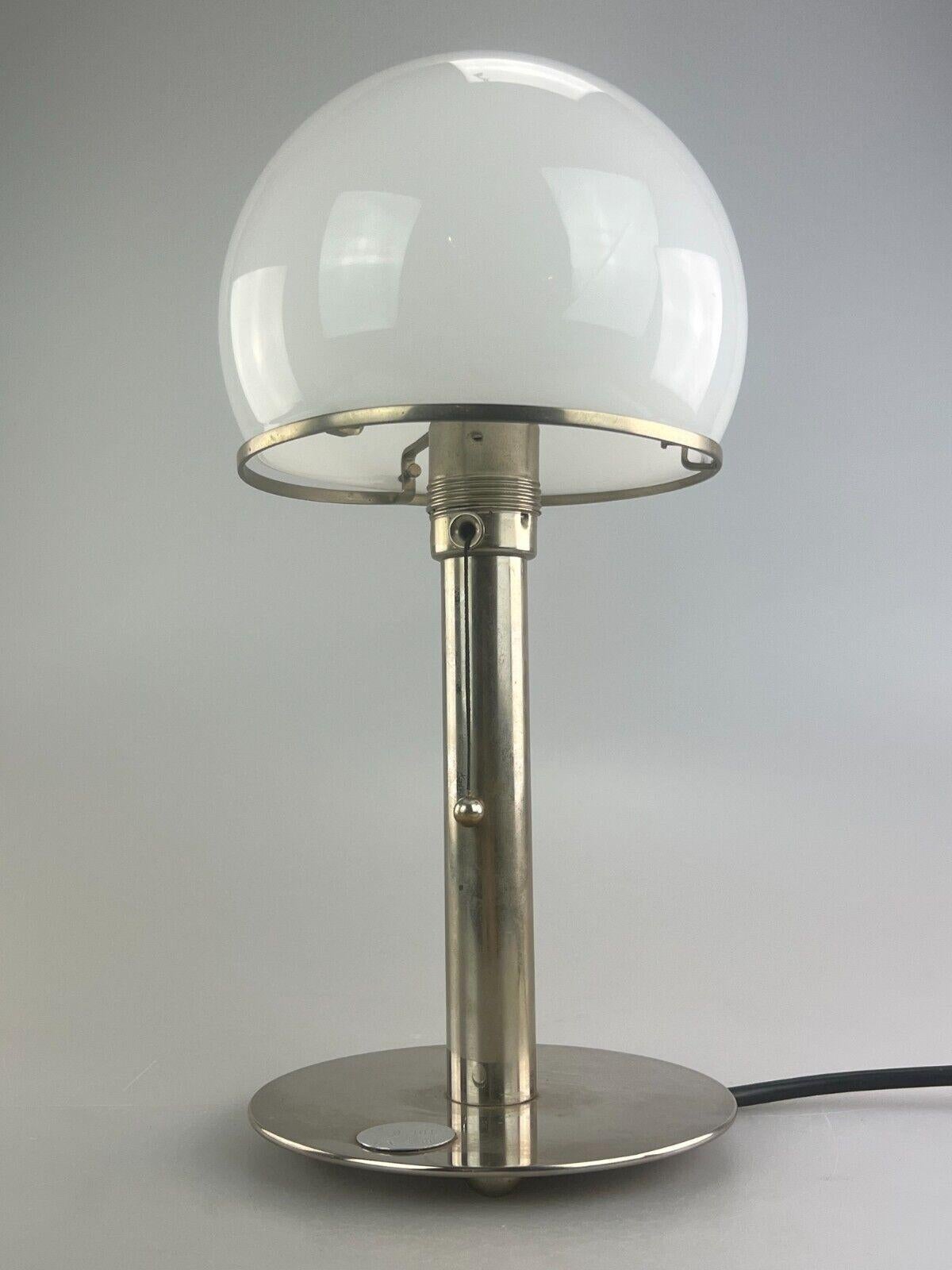 Vintage WA 24 table lamp by Wilhelm Wagenfeld for Tecnolumen Mushroom Bauhaus

Object: table lamp

Manufacturer: Tecnolumen

Condition: good - vintage

Age: around 1980

Dimensions:

Diameter = 18cm
Height = 36cm

Other notes:

The