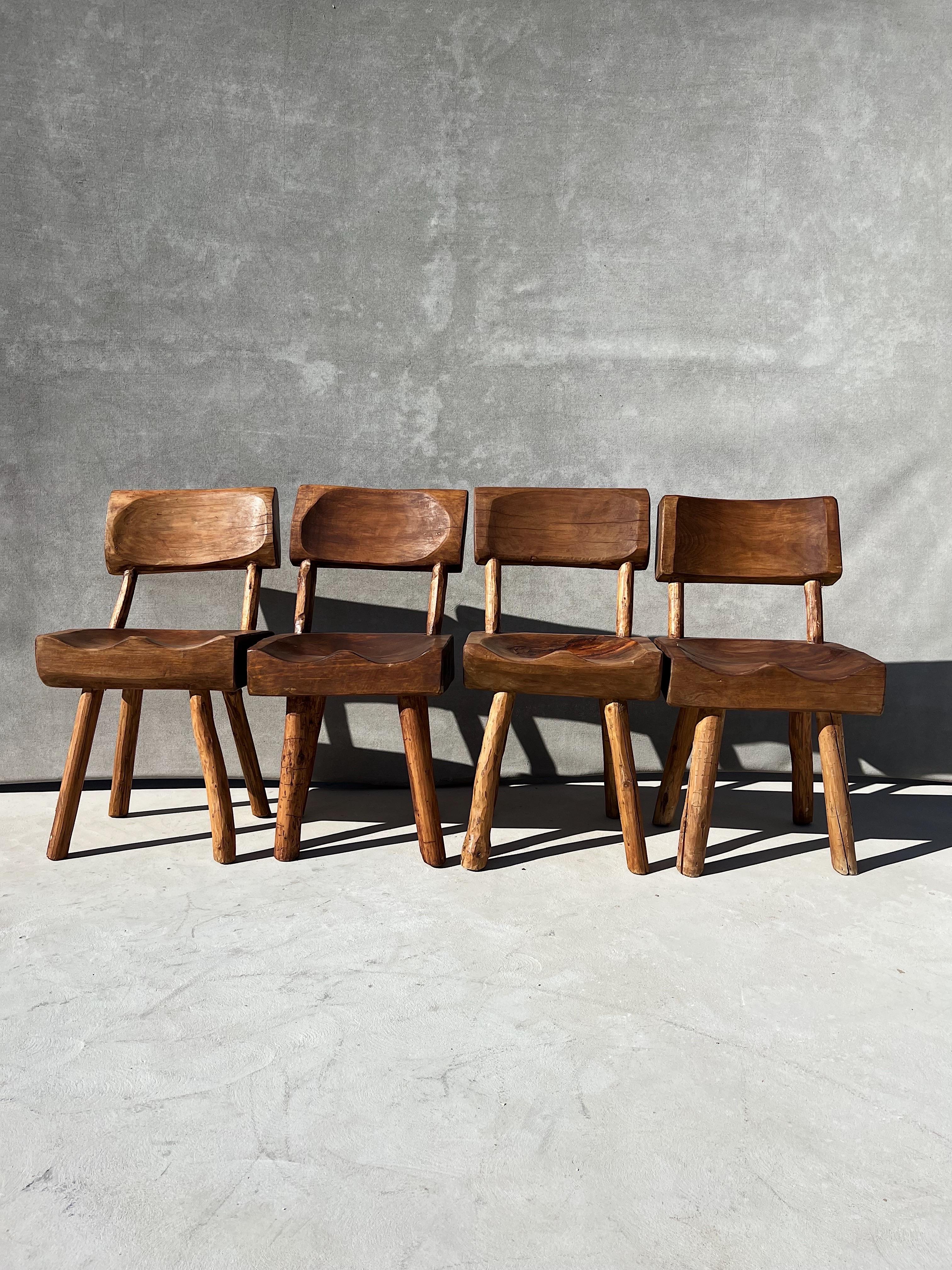 Vintage Wabi-Sabi Artisanal Wood Dining Chairs 

A set of 8 artisanal made dining chairs (16 chairs available), hand-carved from thick slabs of wood 

Showcasing excellent craftsmanship and a unique one of a kind style 

A brutalist primitive