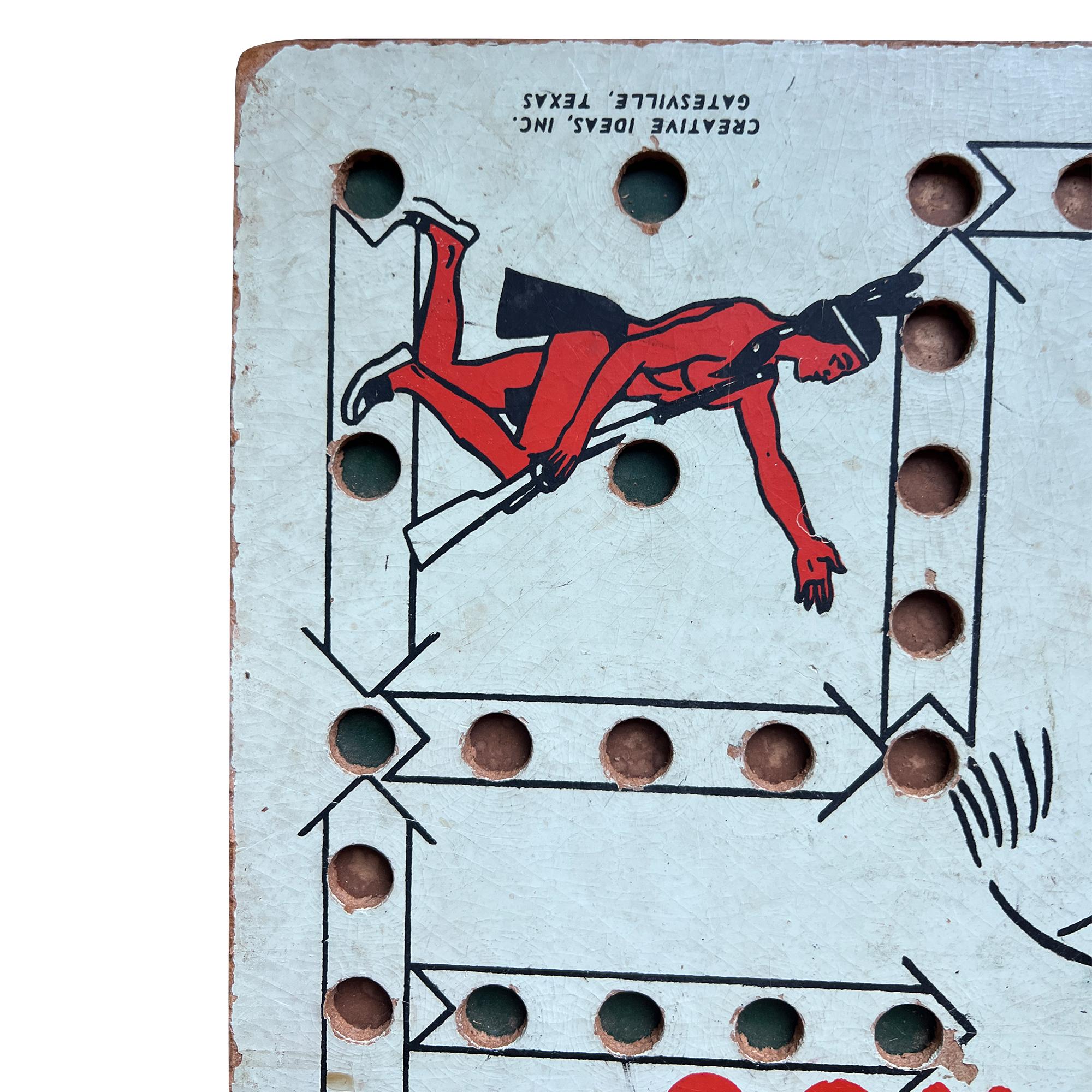 Ce jeu de société Wahoo vintage est autant une œuvre d'art populaire américain qu'un passe-temps nostalgique. Produit par Creative Ideas Inc. à Gatesville (Texas), ce tableau carré réversible est décoré de graphiques audacieux du milieu du siècle,
