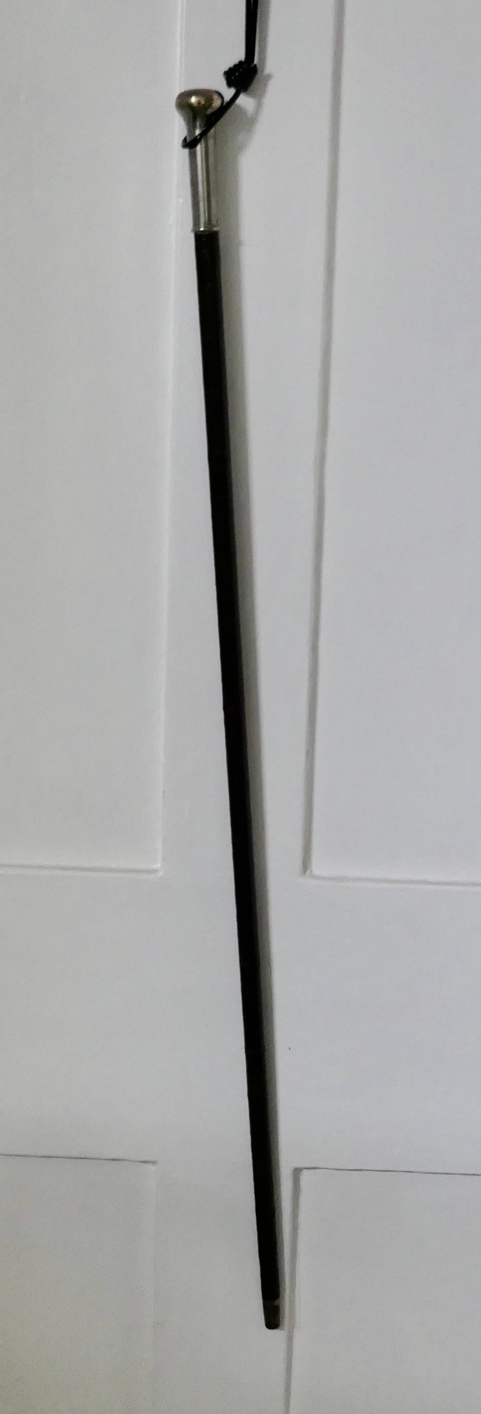 Vintage walking stick petrol cigarette lighter.
Old and very rare, the top of the walking stick unscrews to reveal a petrol lighter in the body of the walking stick.
The body of the walking stick appears to be made in metal covered with leather,