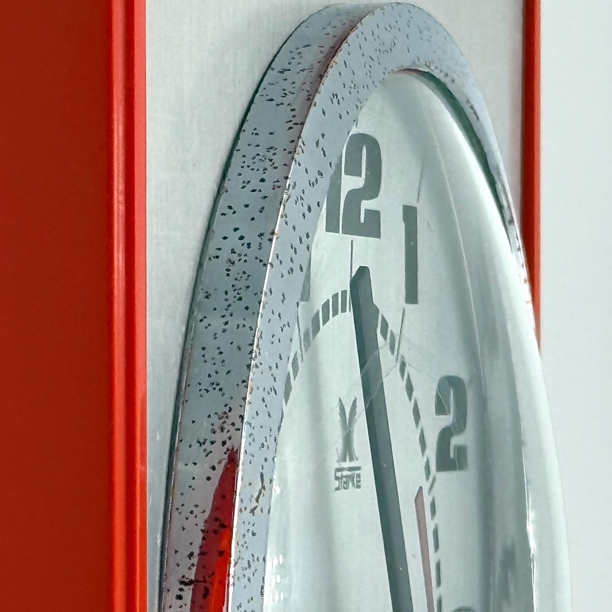 Métal Horloge murale vintage par Stärke - Design des années 70 avec des nuances d'orange et de chrome en vente
