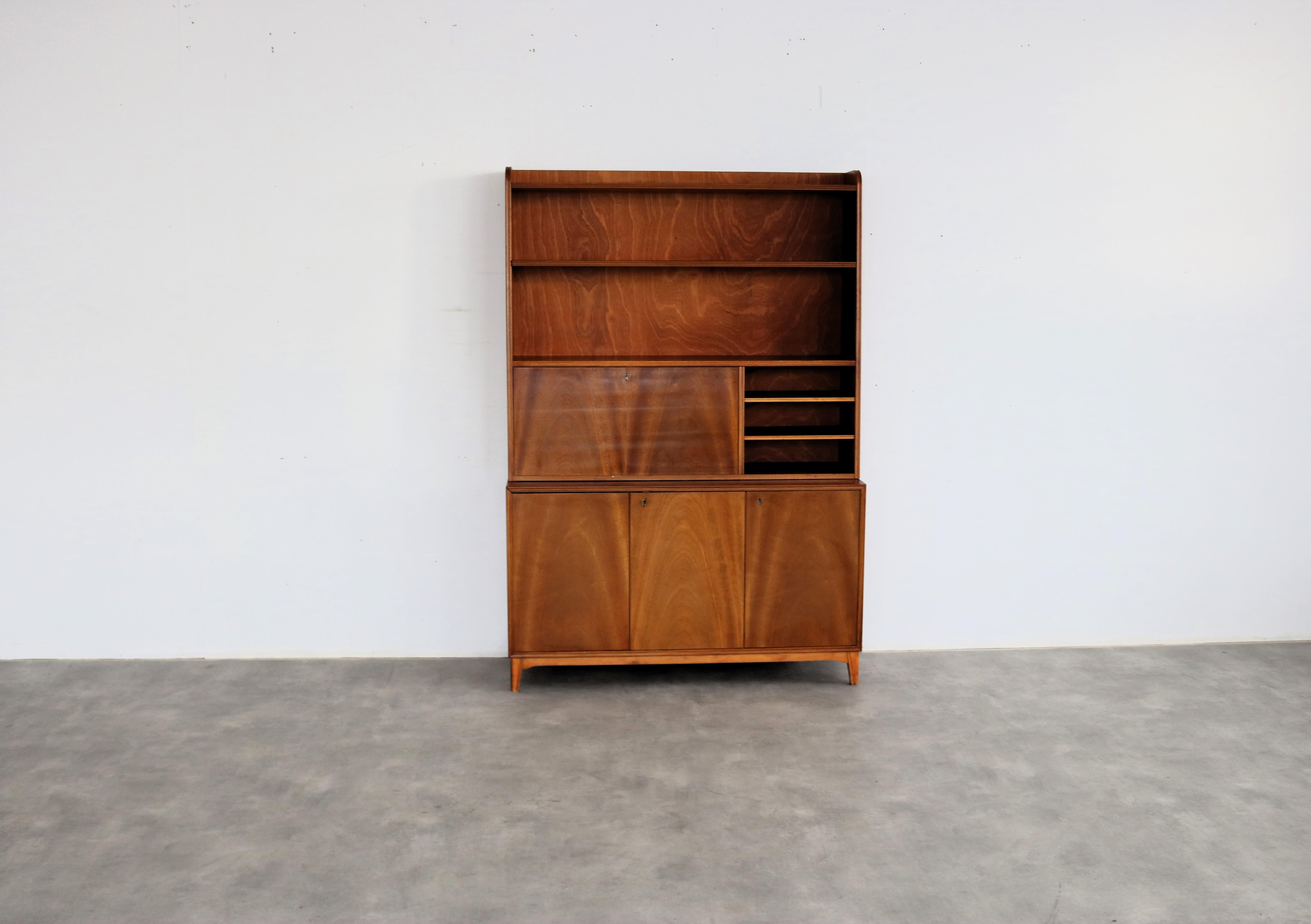 vintage wall cupboard  secretary  60s  Swedish

period  60's
design  unknown  Sweden
condition  good  light signs of use  locks are defective;
size  175 x 120 x 40 (hxwxd)

details  teak;

article number  2552