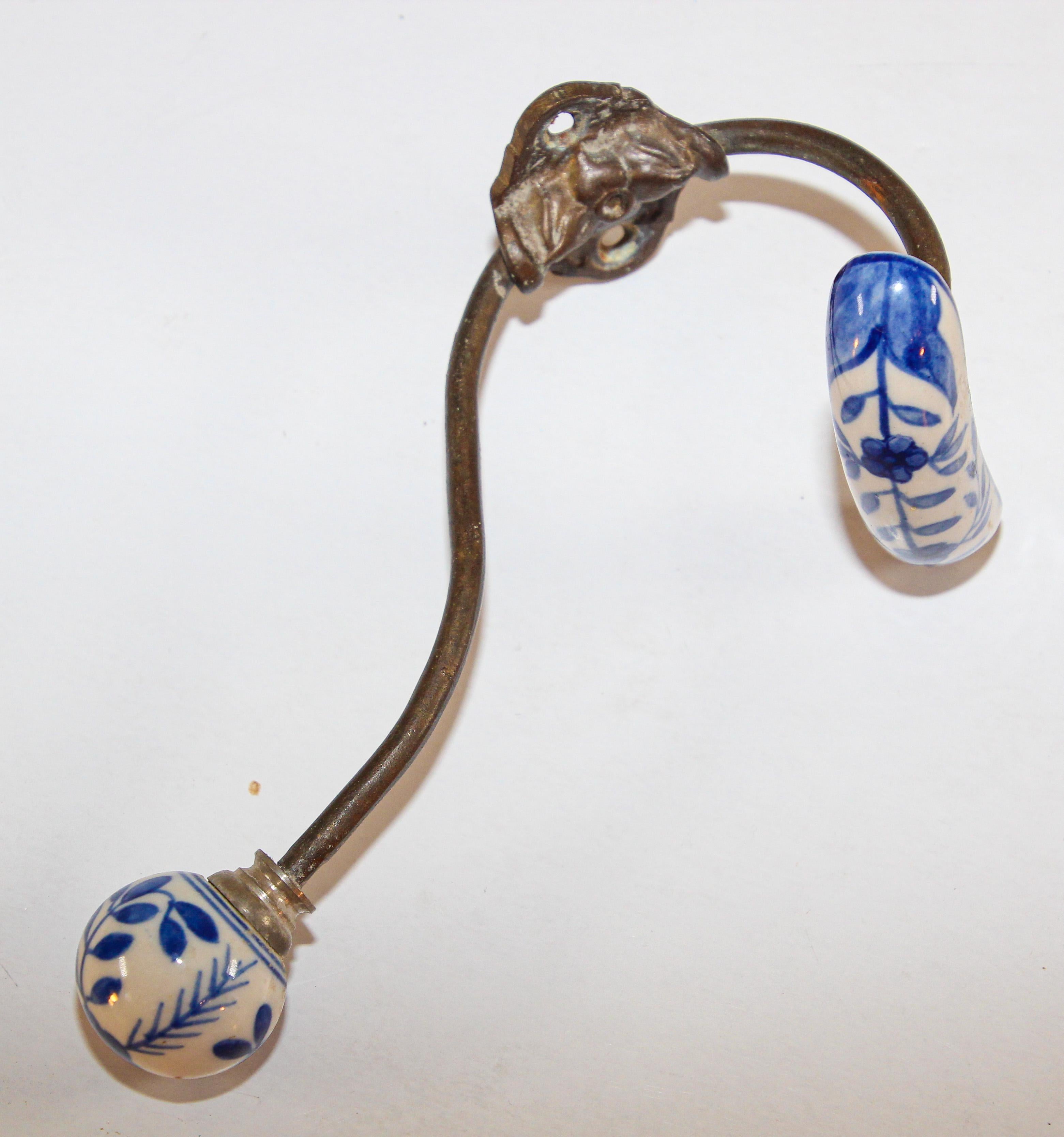 Vintage Wall Double Metal Brass Hook with Porcelain Dutch Delft Style Finals In Good Condition In North Hollywood, CA