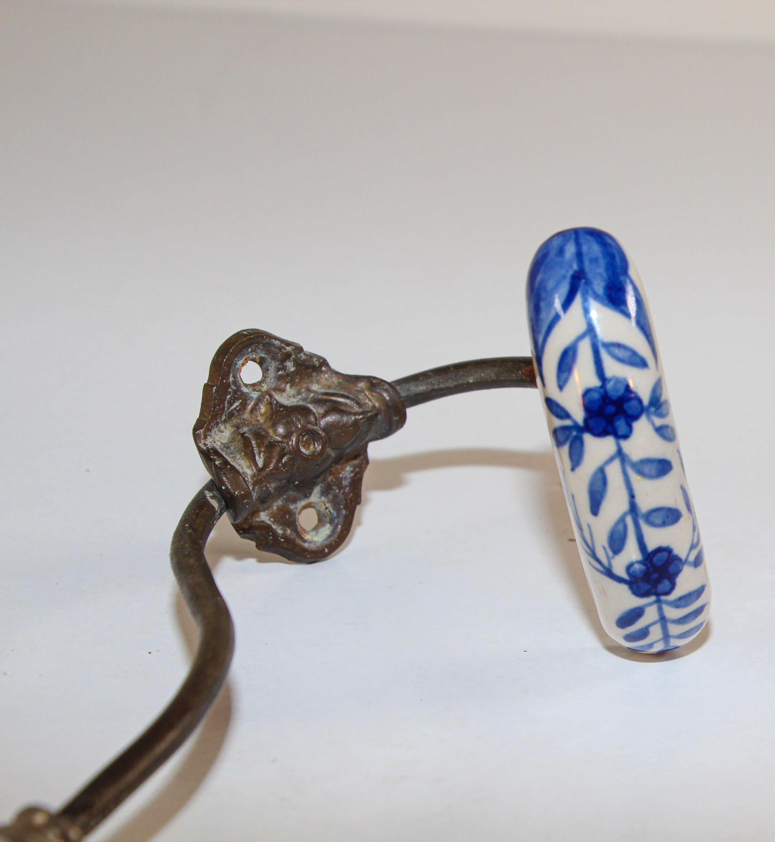 20th Century Vintage Wall Double Metal Brass Hook with Porcelain Dutch Delft Style Finals