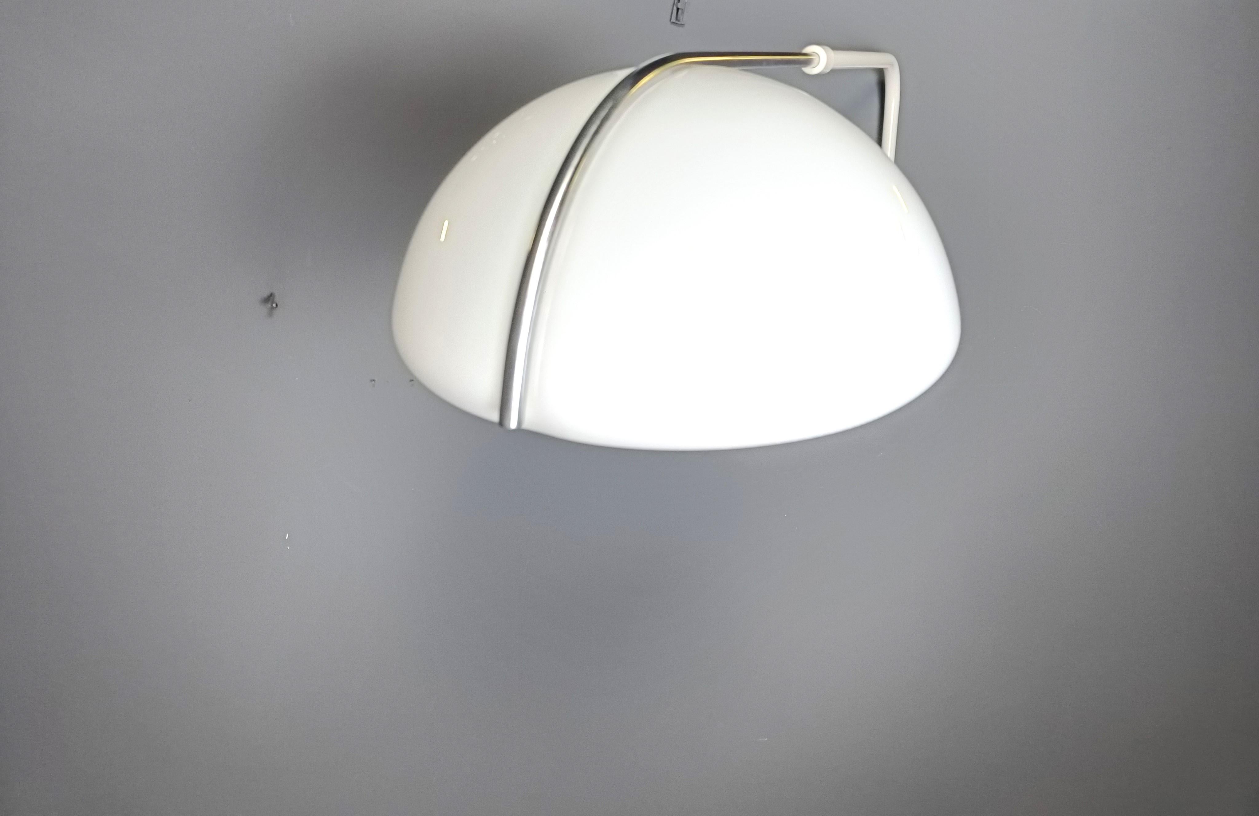 Italian Vintage wall lamp by Luigi Massoni for Guzzini, 1970s For Sale