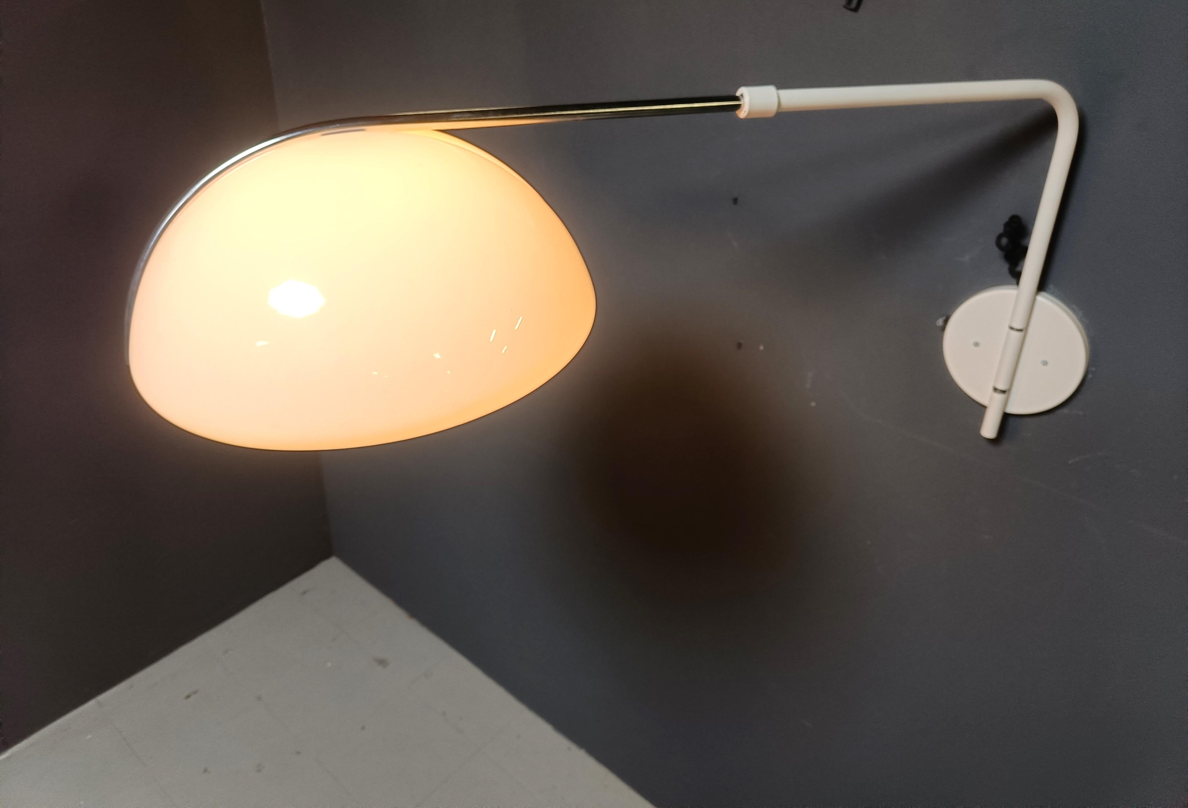 Chrome Vintage wall lamp by Luigi Massoni for Guzzini, 1970s For Sale