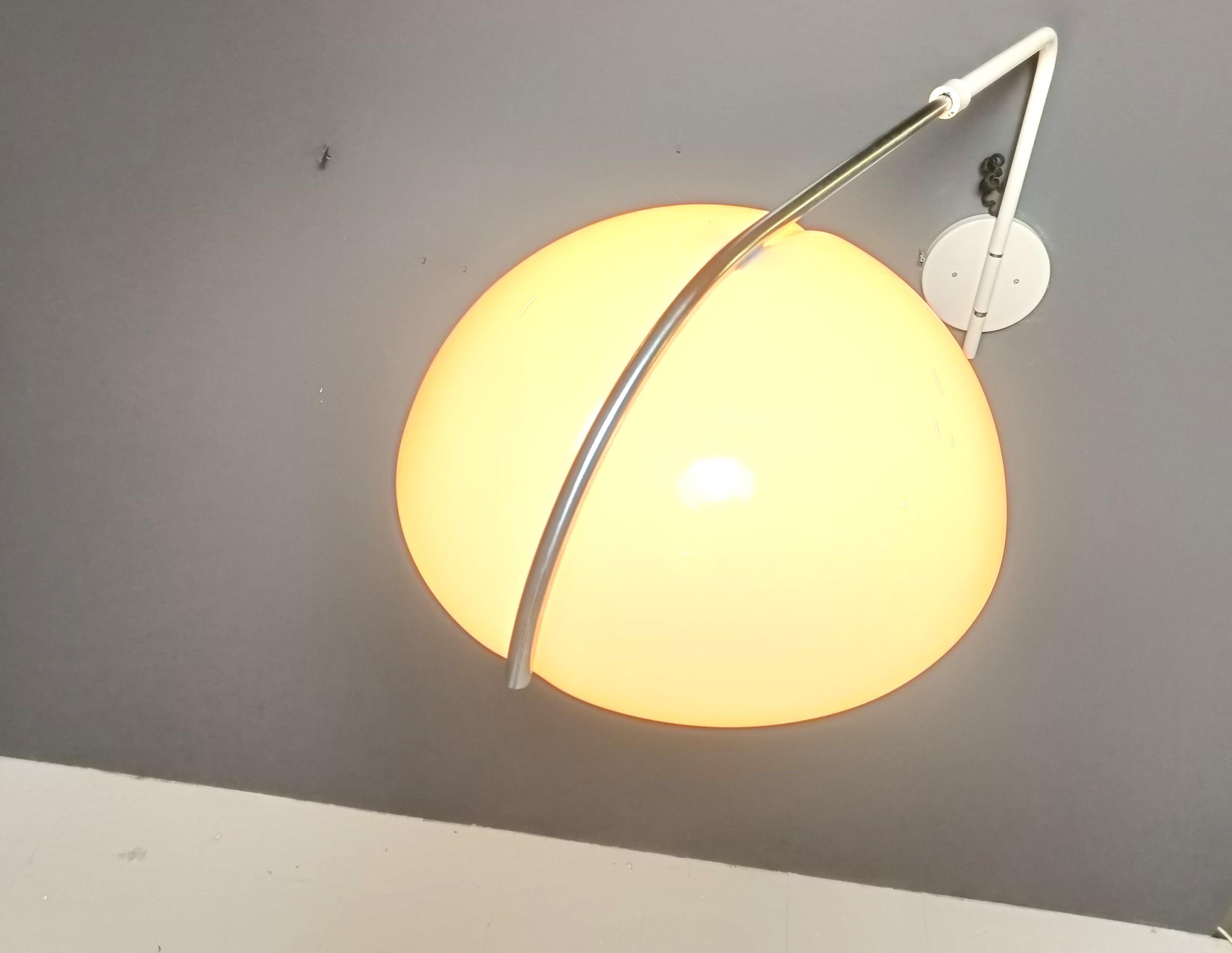 Vintage wall lamp by Luigi Massoni for Guzzini, 1970s For Sale 1