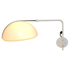 Vintage wall lamp by Luigi Massoni for Guzzini, 1970s