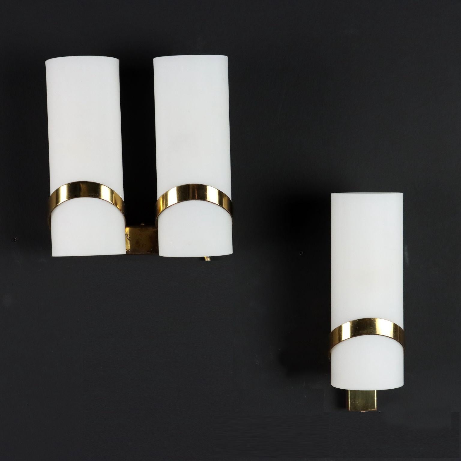 Pair of wall lamps, one of which is single and the other one is double. Brass and opaline glass.