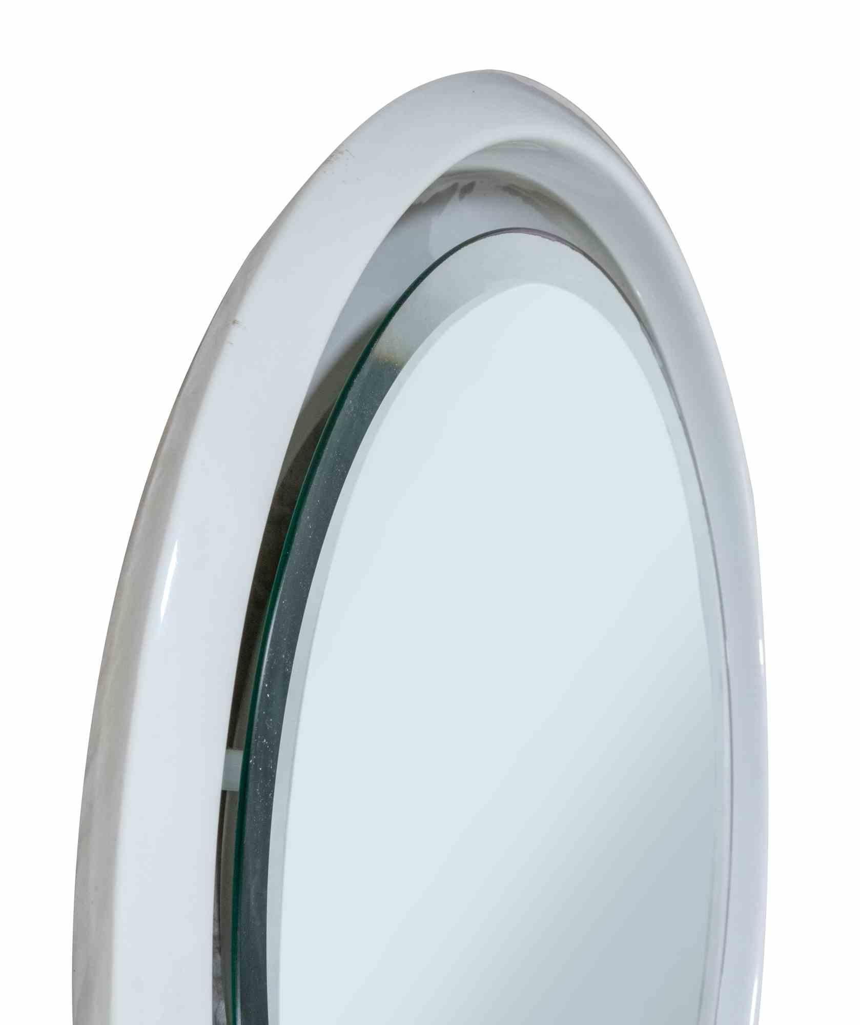 Vintage Wall Mirror  is an original design item realized in the end of 1970s.

Ceramic mirror backlit.

Collect a design item!
