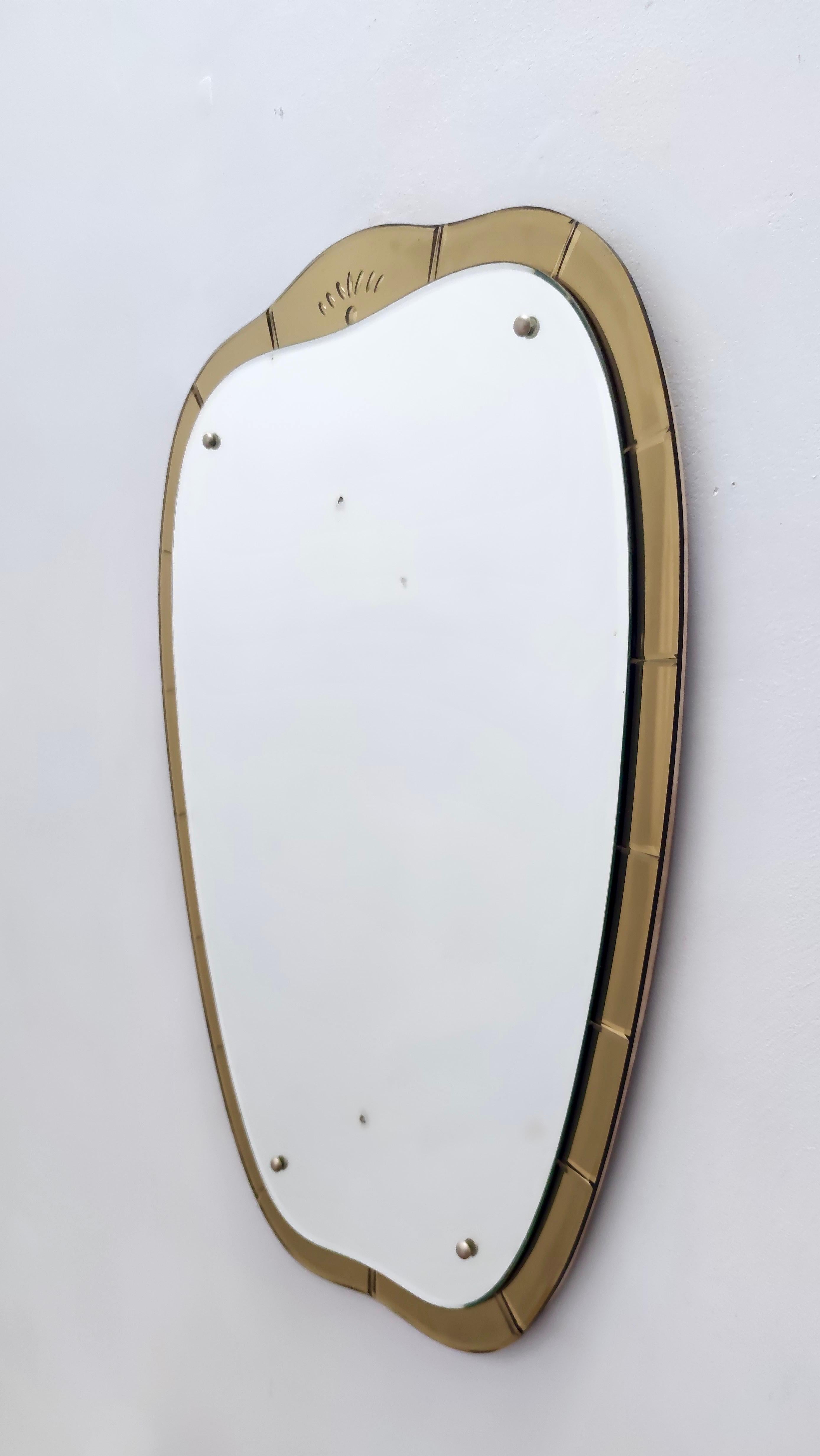 Mid-20th Century Vintage Shield Mirror in the style of Fontana Arte with a Golden Frame, Italy For Sale