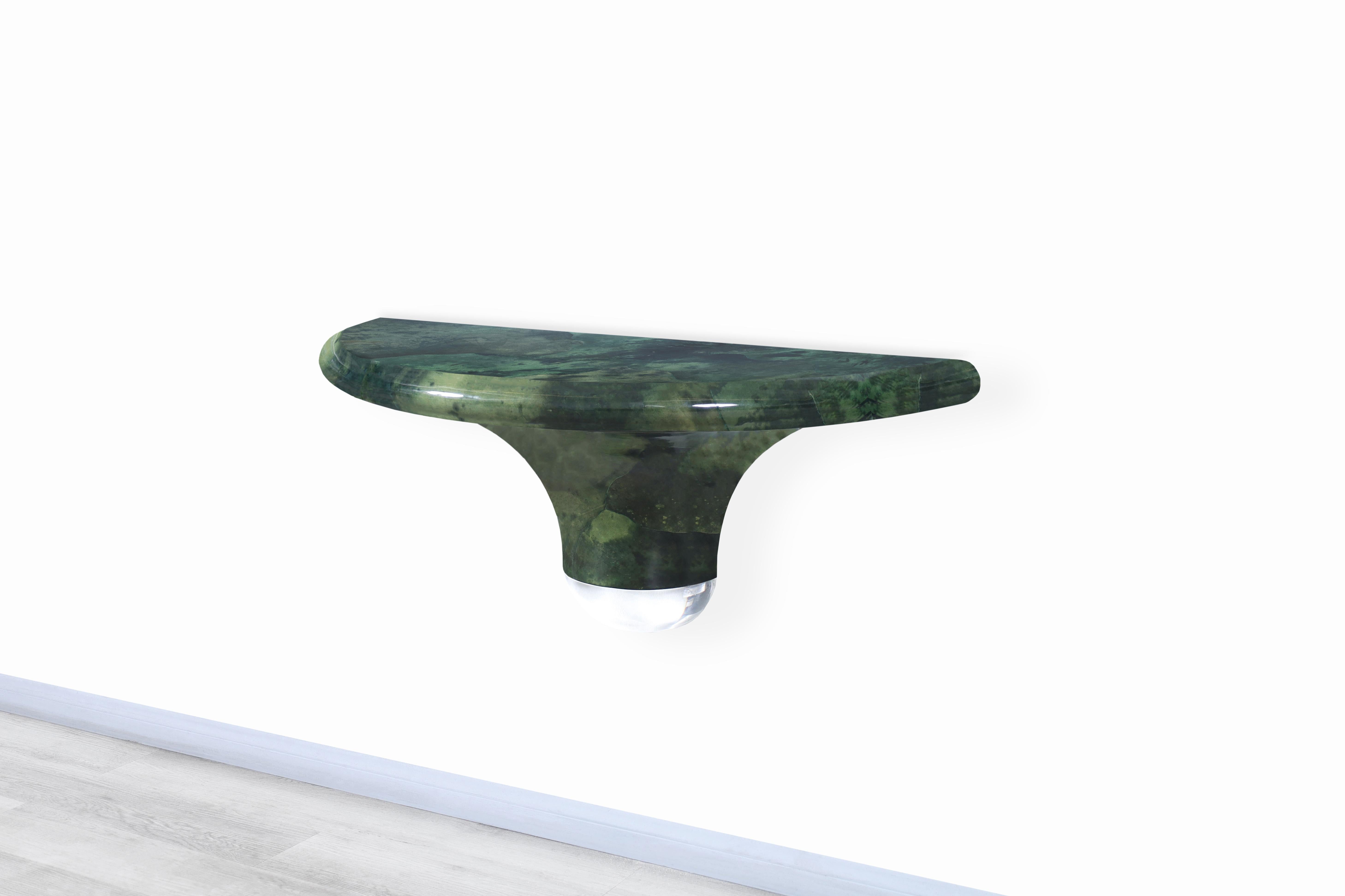 Amazing vintage wall-mounted leather goatskin console table attributed to Aldo Tura and manufactured in Italy, circa 1970s. This table has a conservative design where the quality of the materials used for its construction stands out. This table has