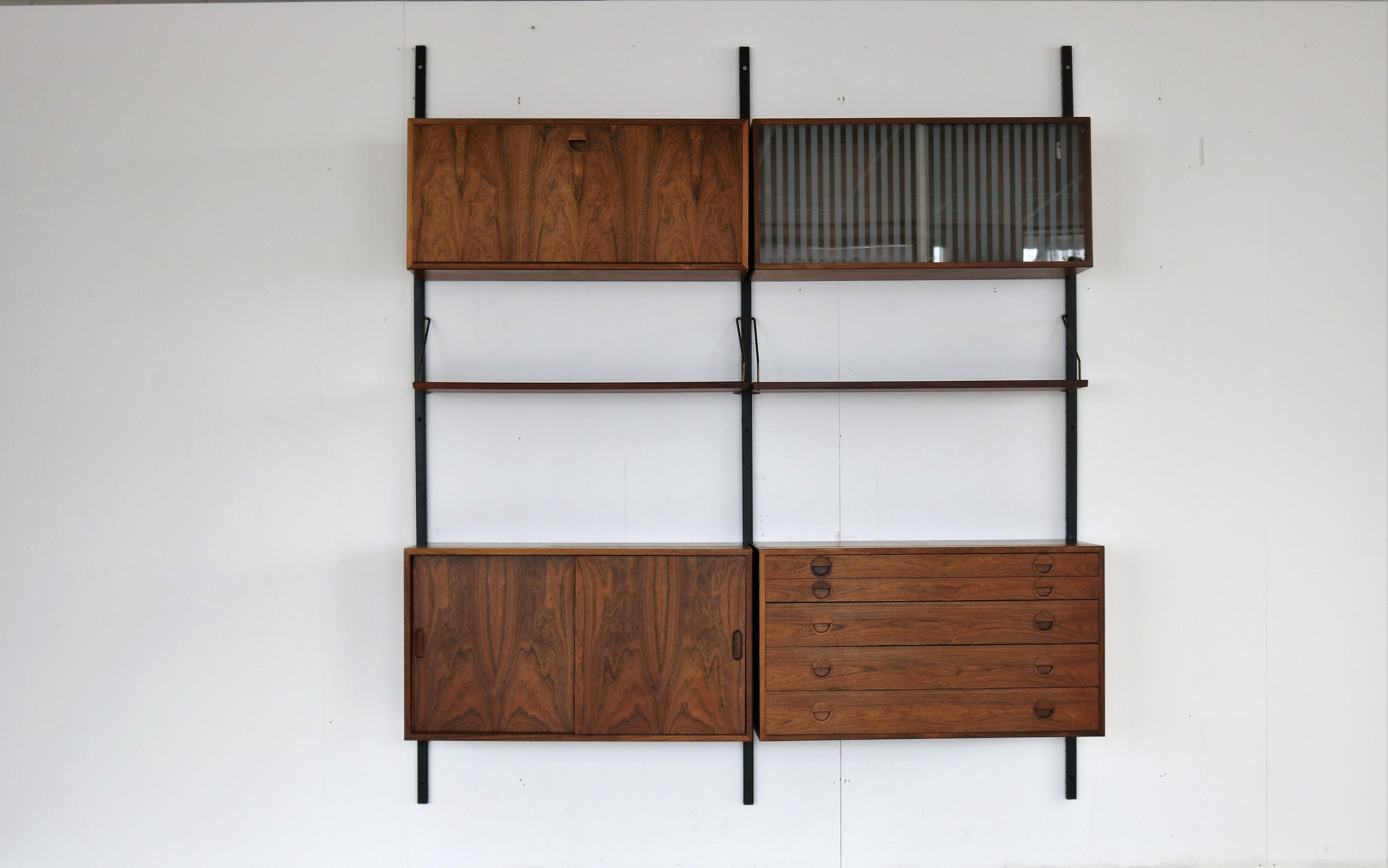 vintage wall system rosewood HG Furniture Danish (3)

Rosewood wall system from HG Furniture. The system is of high quality and can be arranged according to your own wishes.

period 1960s
designs HG Furniture Denmark
conditions good light