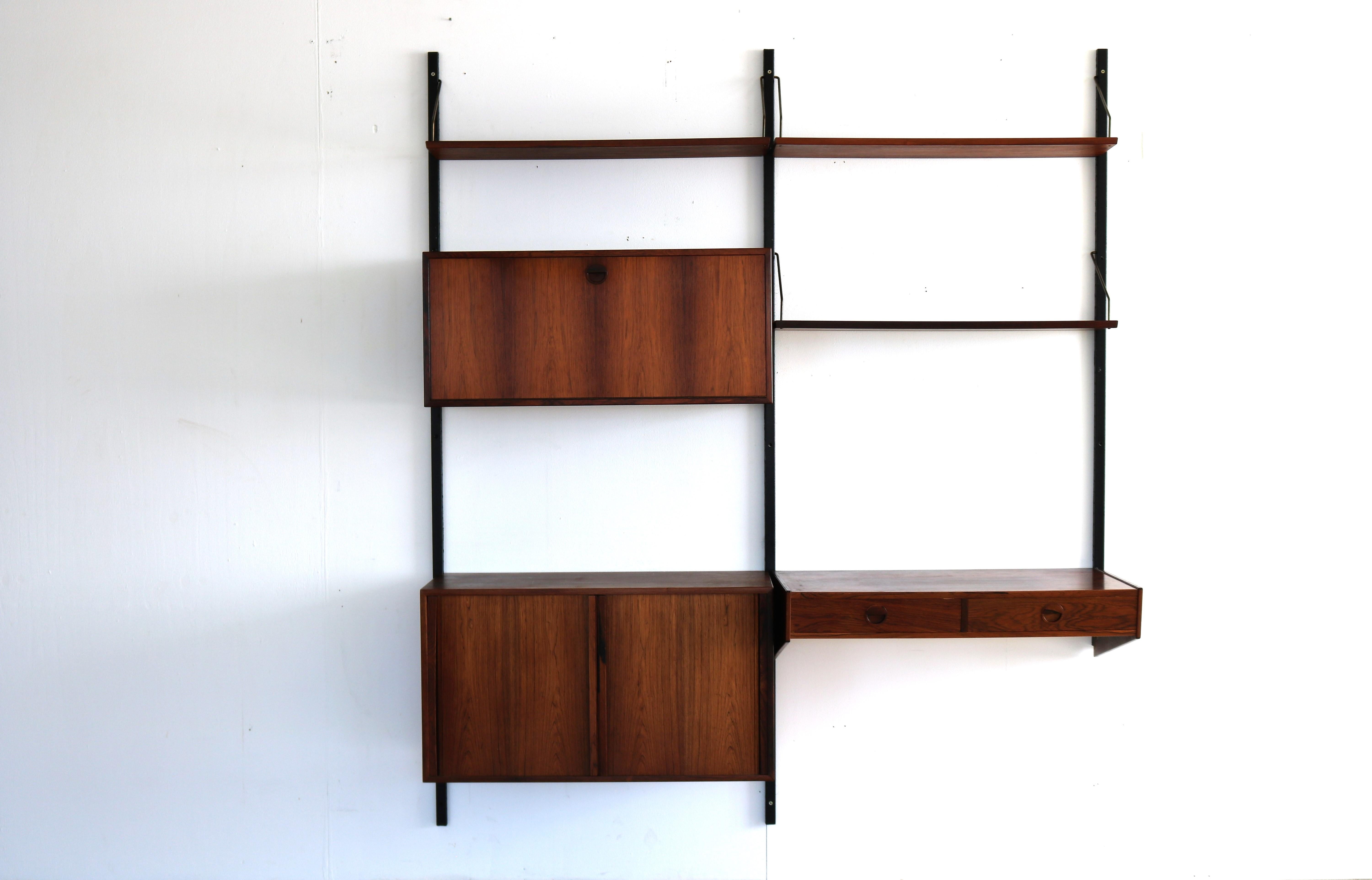 vintage wall system rosewood HG Furniture Danish (4)

Rosewood wall system from HG Furniture. The system is of high quality and can be arranged according to your own wishes.

Period 1960s
Designs HG Furniture Denmark
Conditions good light