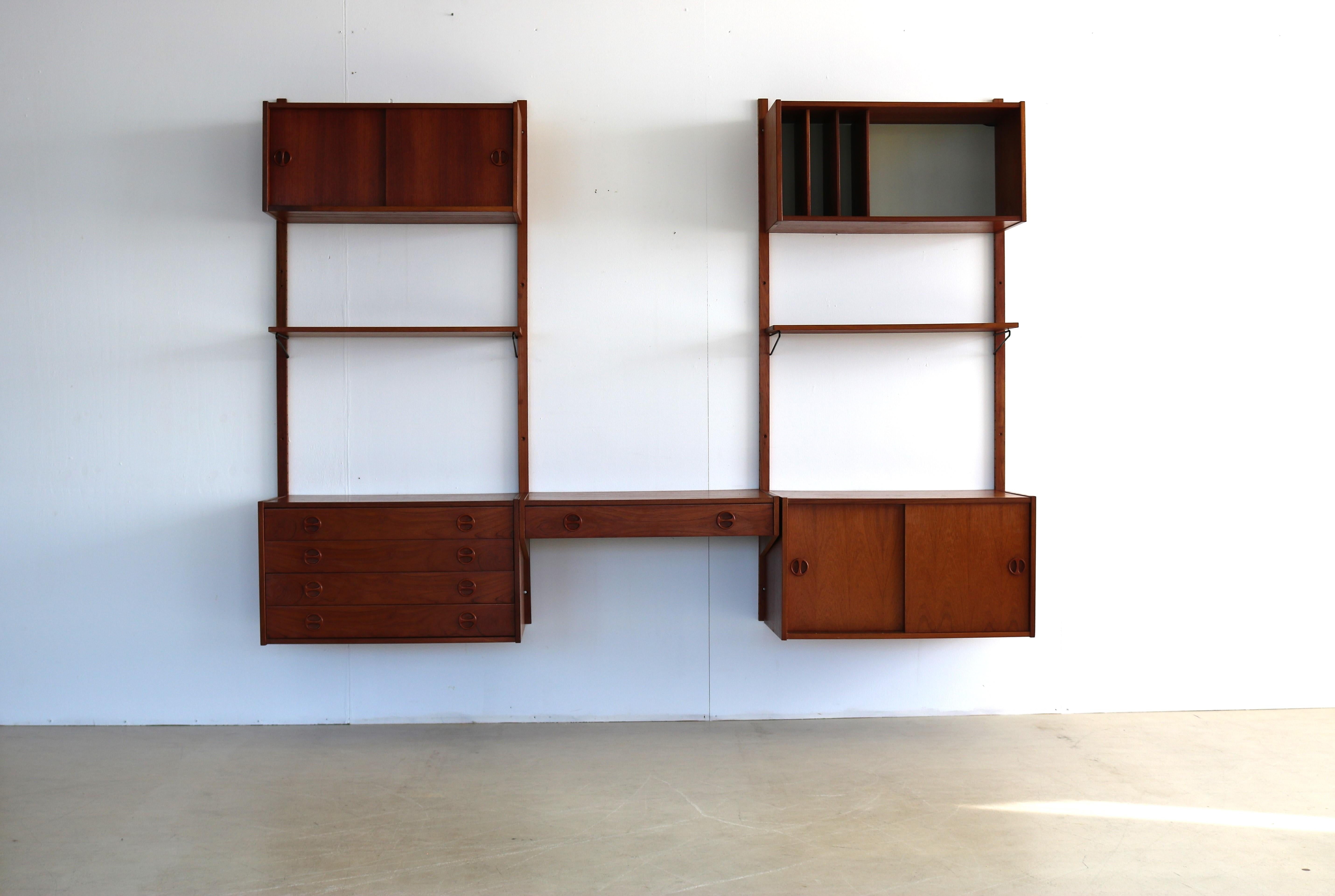 vintage wall system  wall unit  teak  60s  Danish

period  60's
designs  unknown  Denmark
conditions  good  light signs of use
size  175 x 244 x 45 (hxwxd)

details  teak; modular;

article number  1886