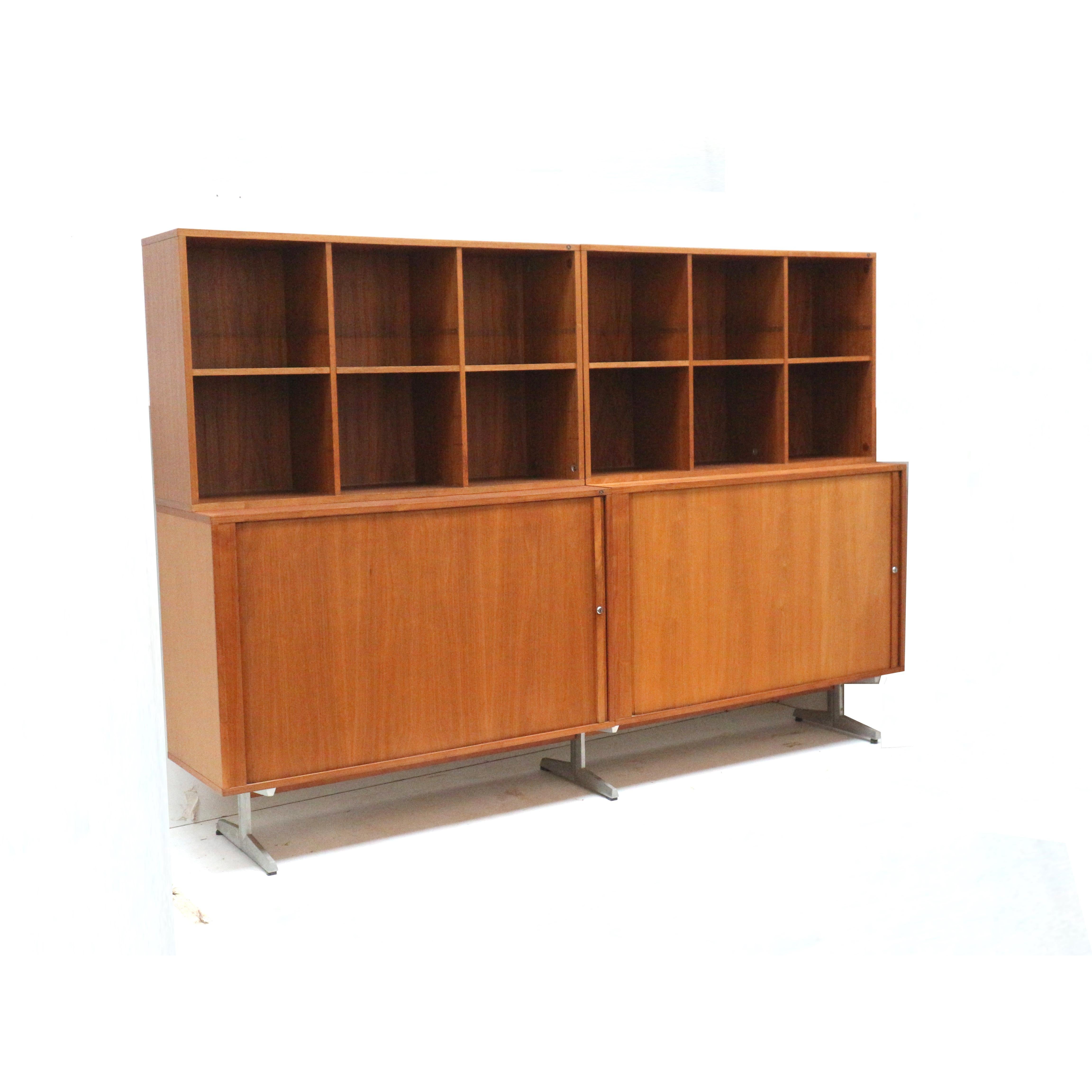 Vintage wall unit by Marius Byrialsen for Nipu from the 1960s.

Dimensions:
Width: 240.3 cm
Height: 165.5 cm
Depth (top): 31 cm
Depth (bottom): 45 cm

The cabinet has some traces of use appropriate to its age.