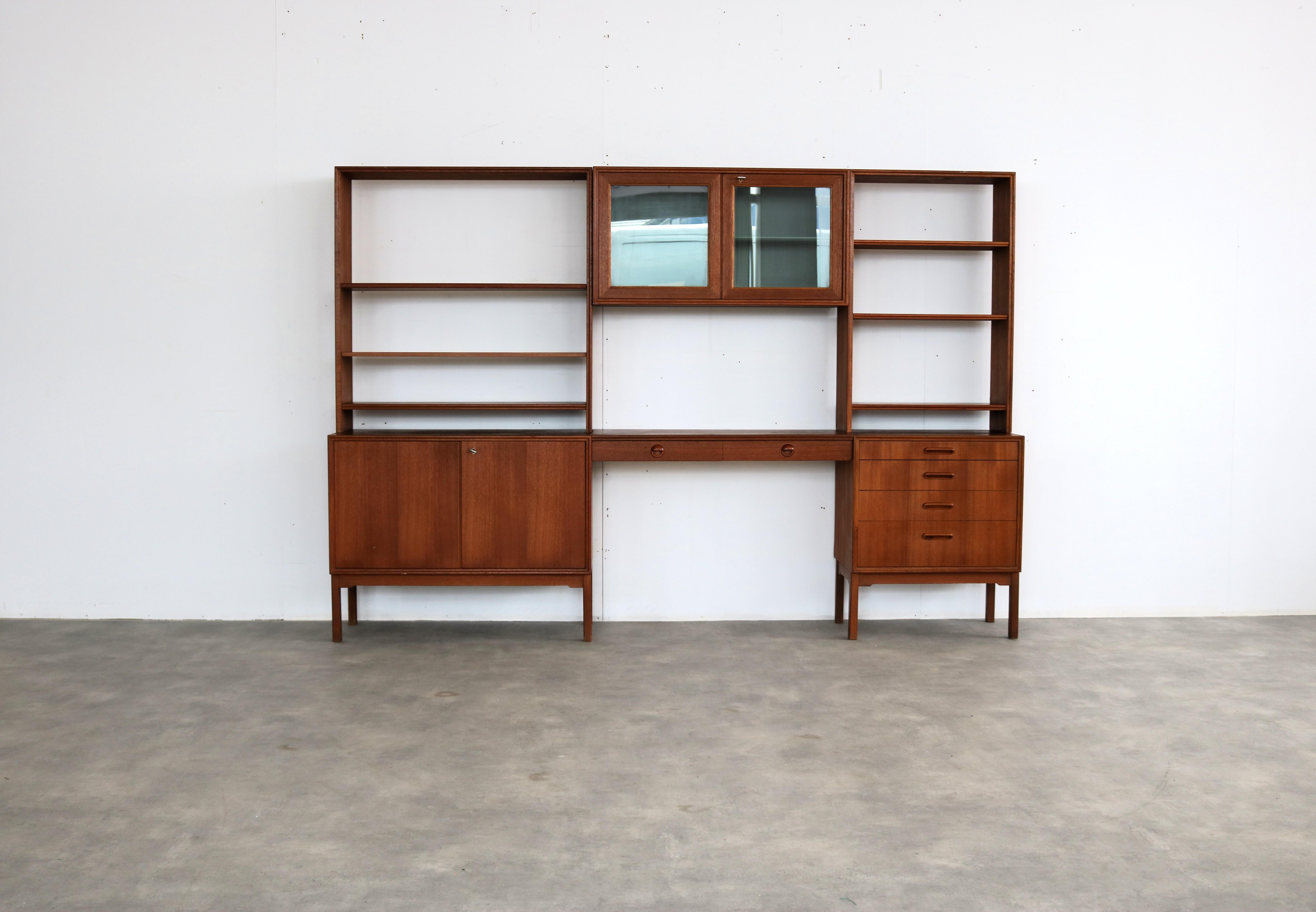 vintage wall unit  teak  Karlitt  1960s  Swedish

period  1960s
design  Karlit  Sweden
condition  good  minor signs of use
size  165 x 240 x 41 (hxbxd)

details  teak; glass; 

item number  2766