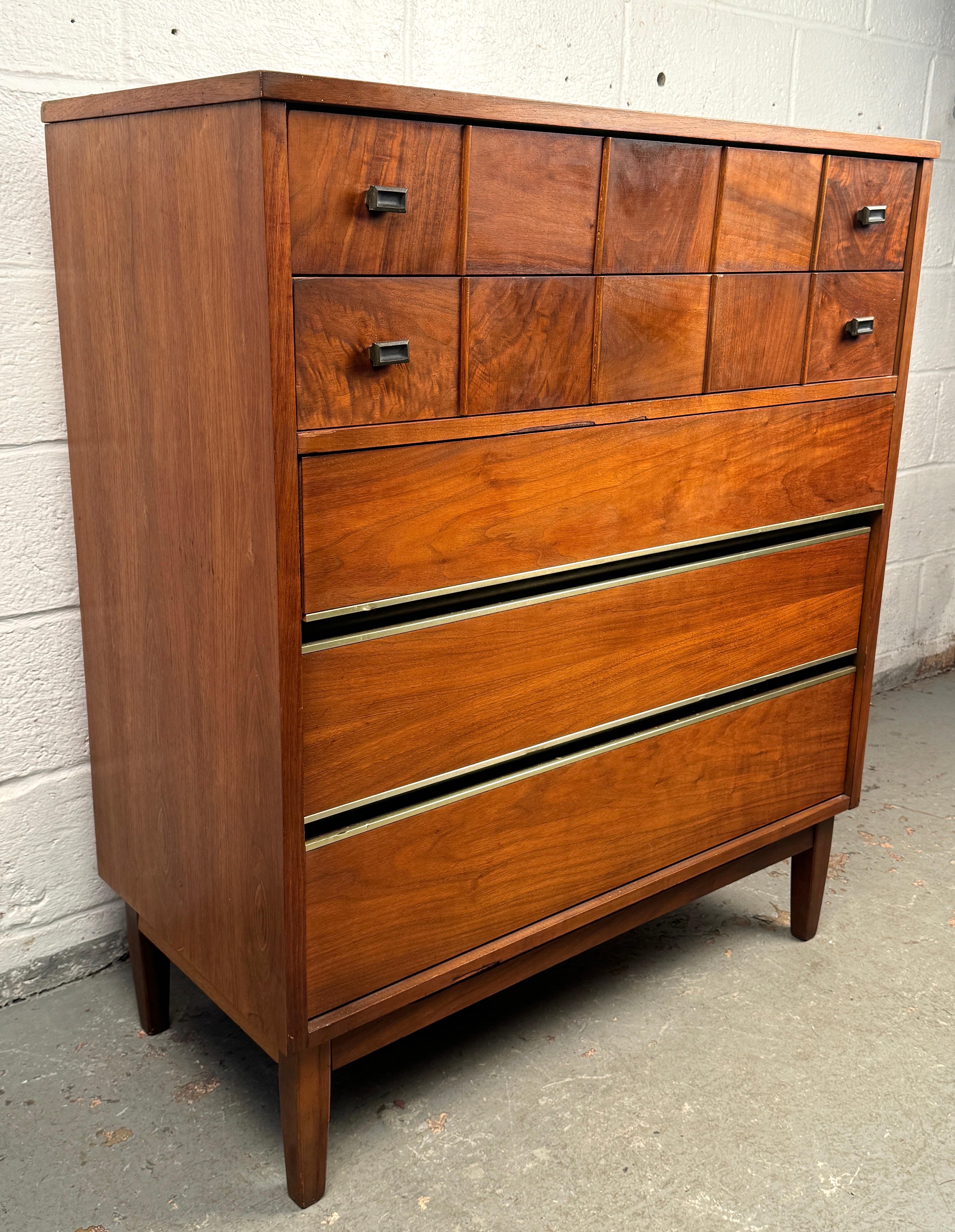 Stunning Vintage Walnut Burl Highboy Dresser, a piece that blends refined elegance with functional design. Featuring a dramatic burl wood grain and warm walnut tones, this tall dresser offers a striking silhouette perfect for both traditional and