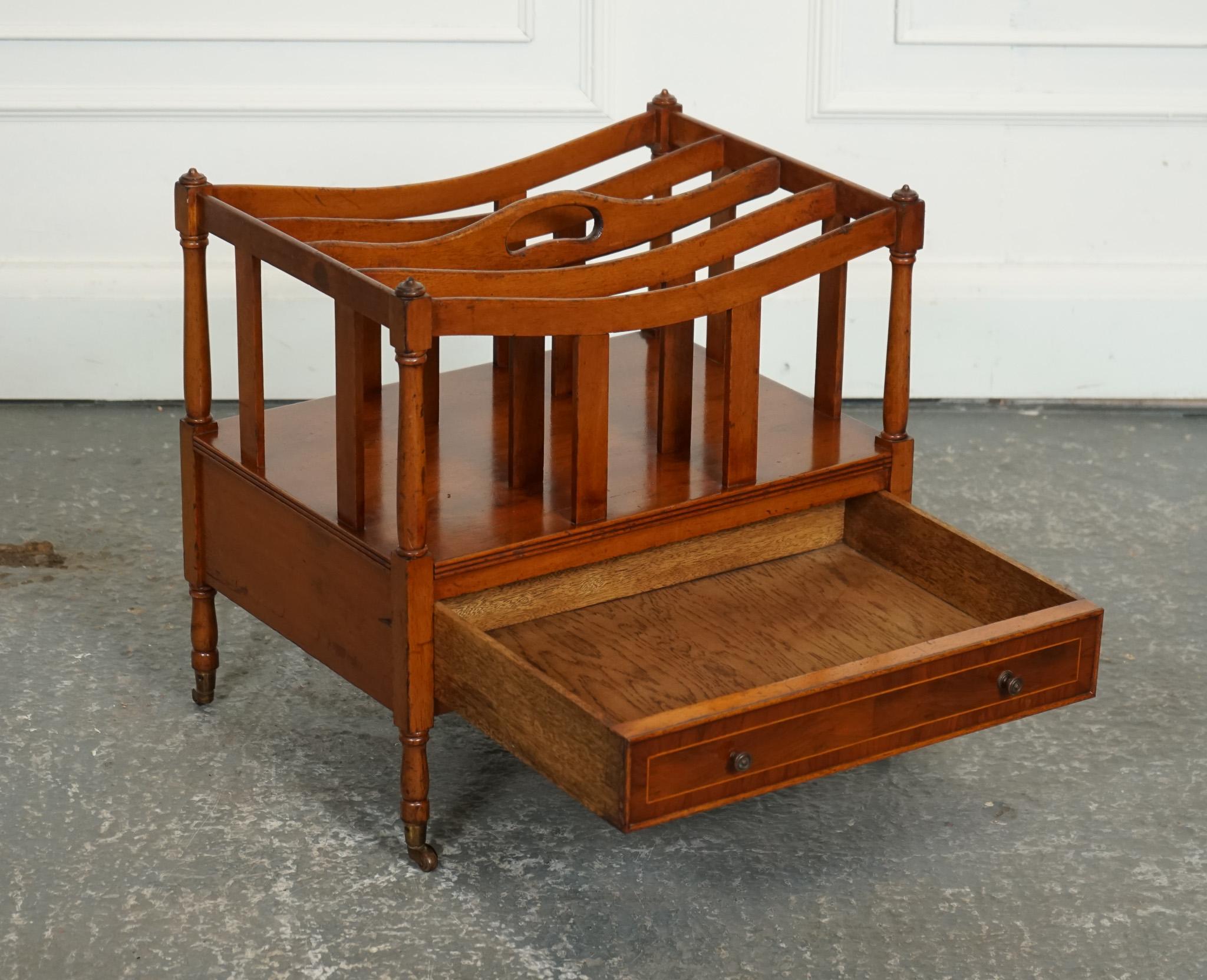 

We are delighted to offer for sale this Vintage Walnut Wood Magazine Rack.

A vintage walnut Canterbury newspaper rack with brass handles is a charming and elegant piece of furniture that exudes a sense of nostalgia and sophistication. This type
