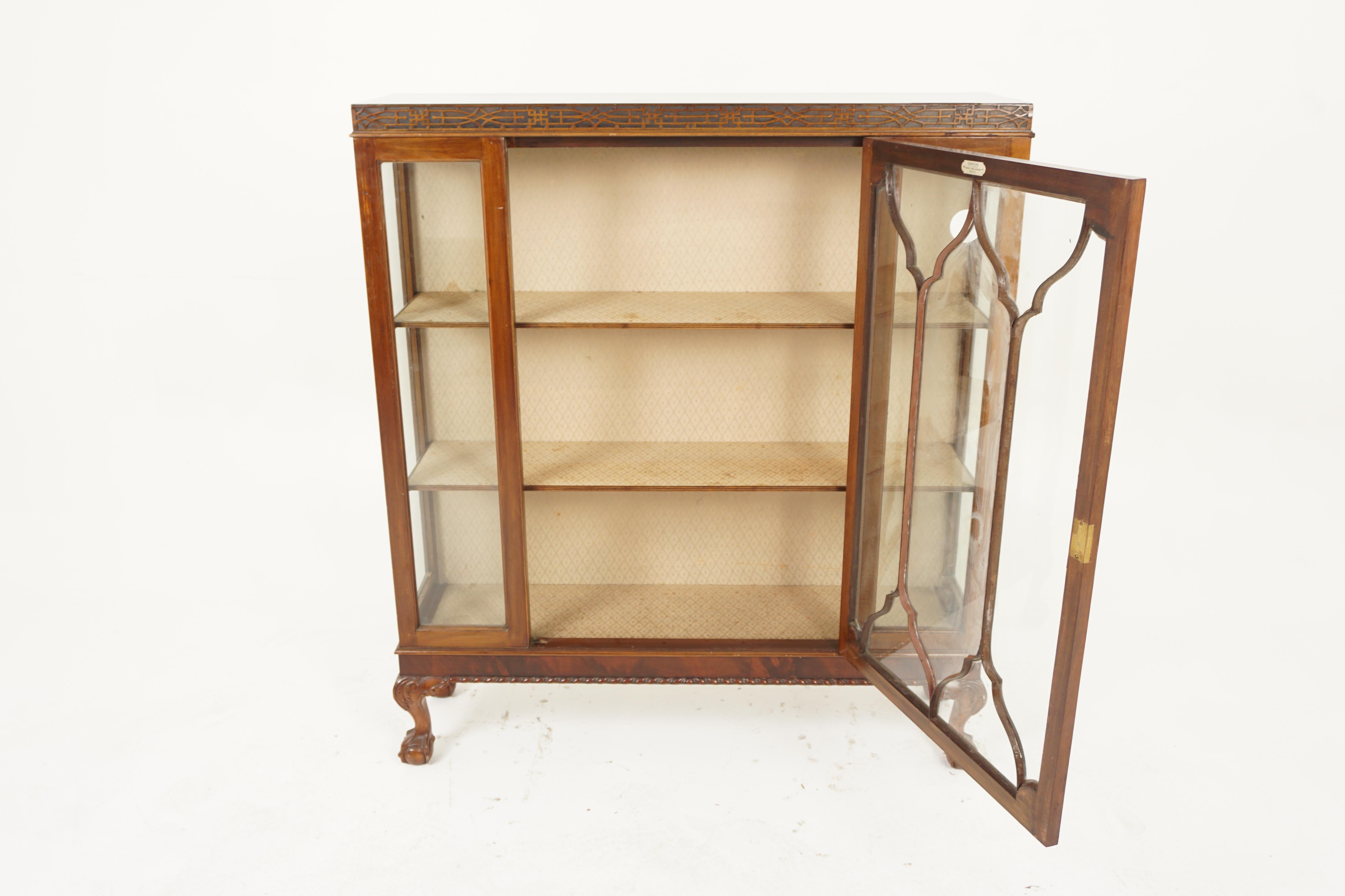 Vintage Walnut China Cabinet, Display Cabinet, Camerons Perth, Scotland 1930, H1008

Solid Walnut
Original finish
Rectangular moulded top
Carved fretwork underneath
Single original glass door with shaped moulding on the front
Pair of side windows on