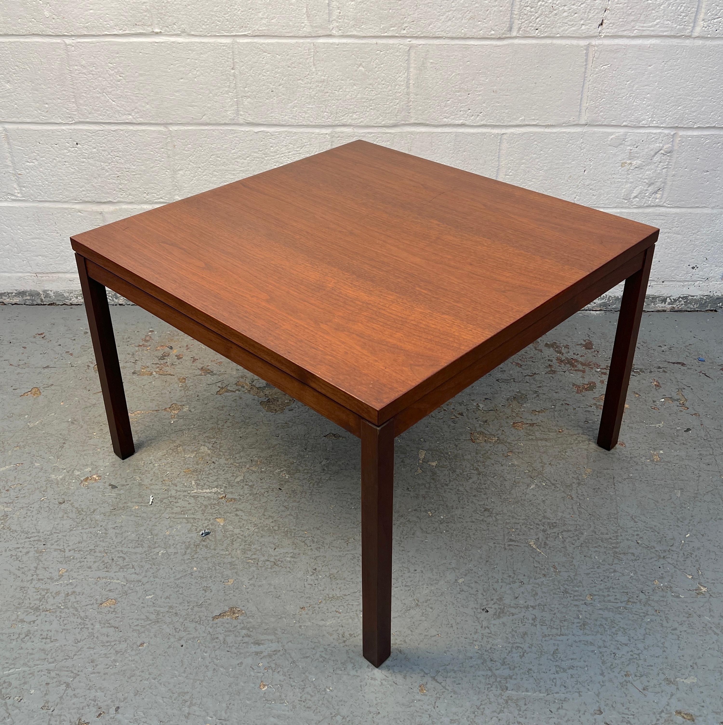 Elegant square coffee table by Steelcase crafted in rich walnut, featuring a sleek, structured profile and warm natural finish. Its balanced proportions and timeless design make it a versatile centerpiece for contemporary or mid-century-inspired