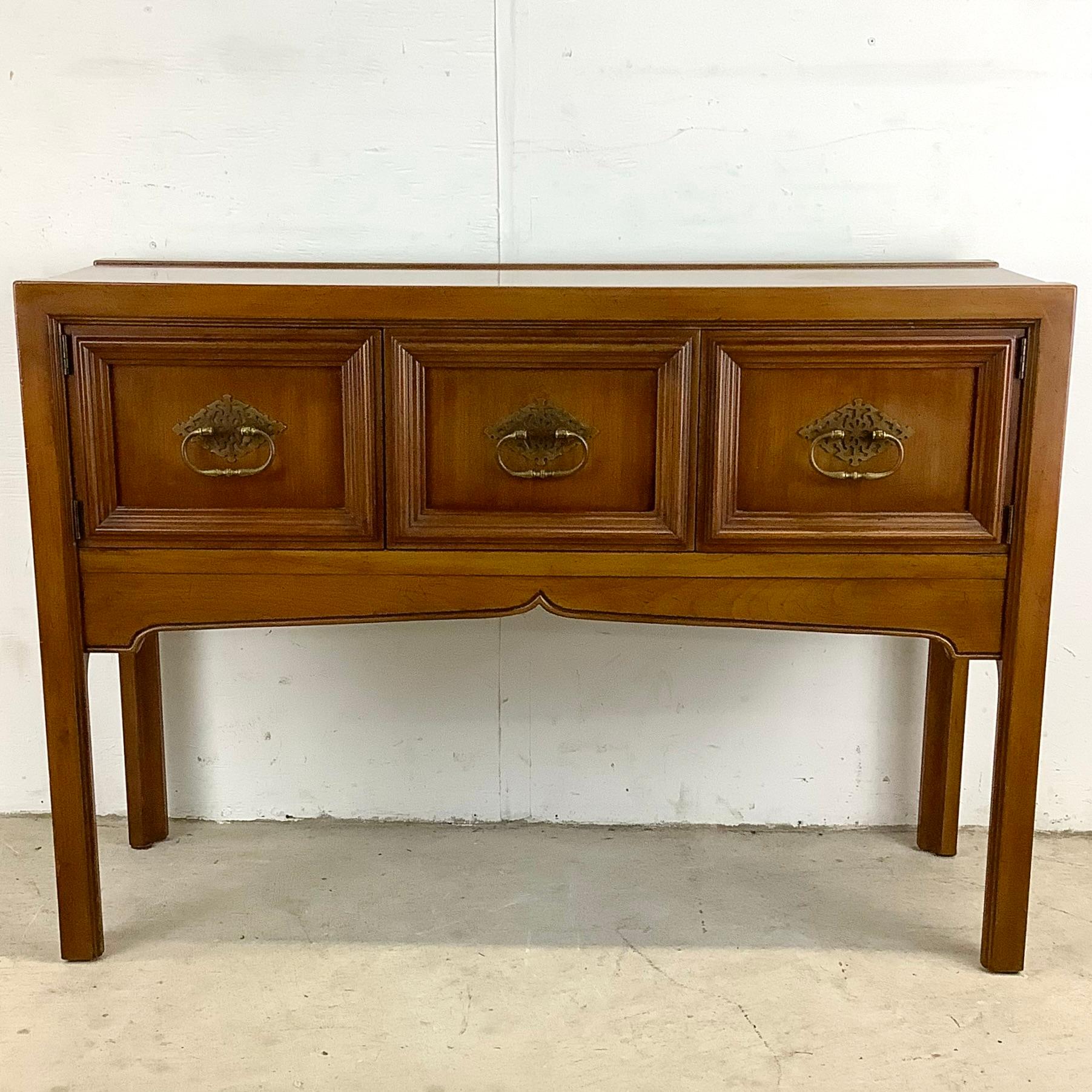 Introducing this remarkable Vintage Walnut Console Cabinet, a timeless piece that combines vintage allure with functional design. This stunning cabinet showcases the craftsmanship and elegance that vintage American furniture is renowned