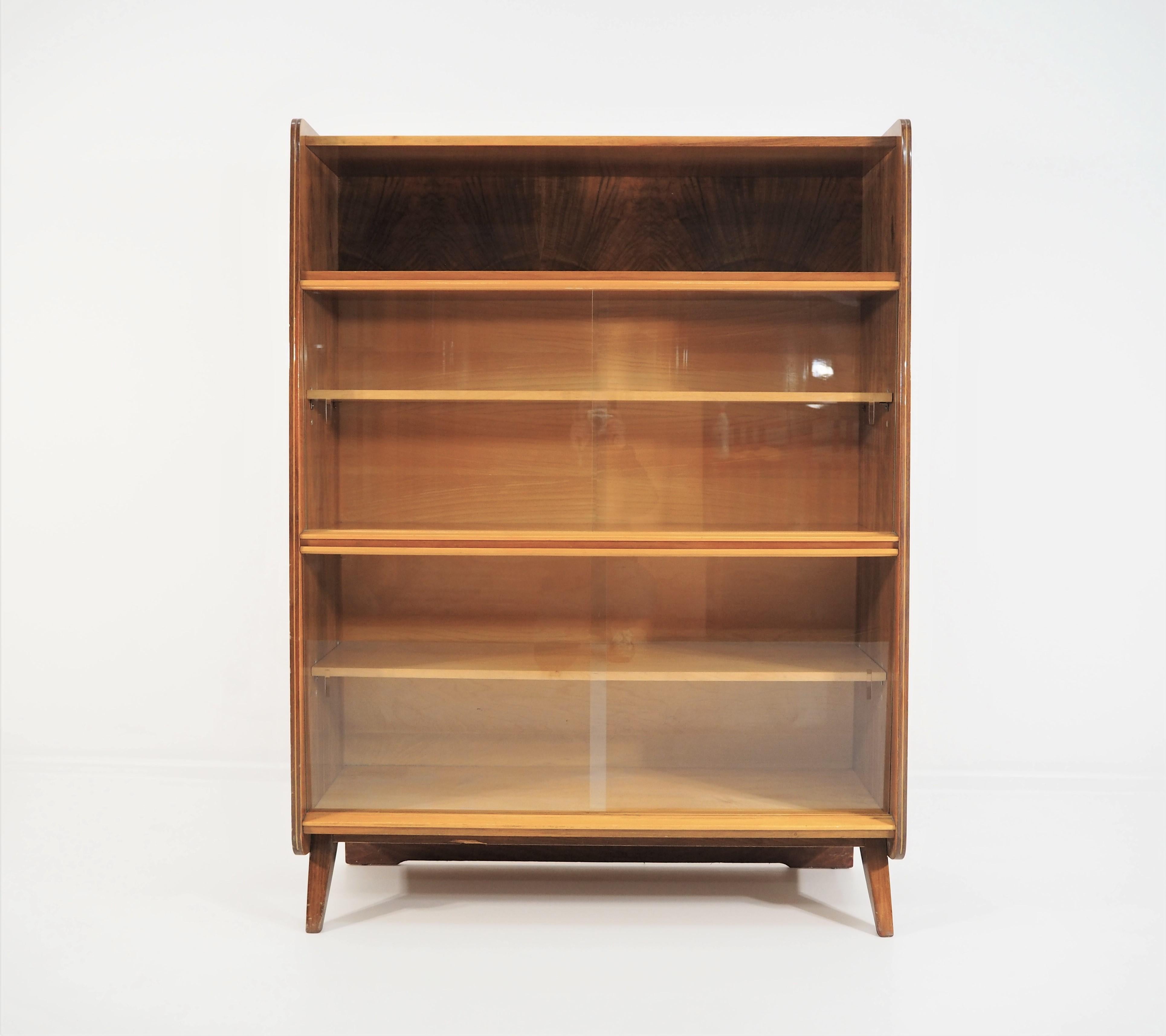 Vintage walnut vitrin from Tatra, 1966s. The walnut vitrin preserved in a rare original and excellent external and internal condition. Dimensions: height 157cm, width 117cm, depth 40cm.
