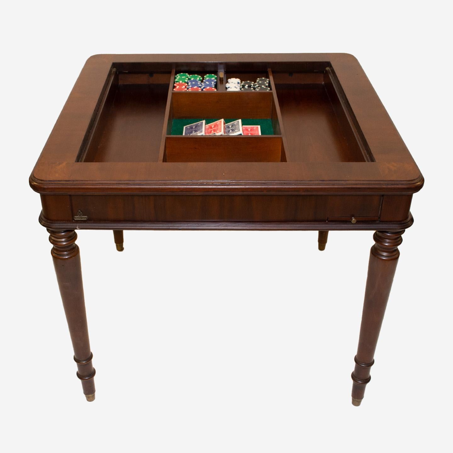 Designed by Francisco Hurtado, this classic square game table was manufactured in Spain by Hurtado Valencia in the 1990s. Constructed in walnut, the board lifts off with the aid of a simple pull mechanism, to reveal a hidden storage compartment. The