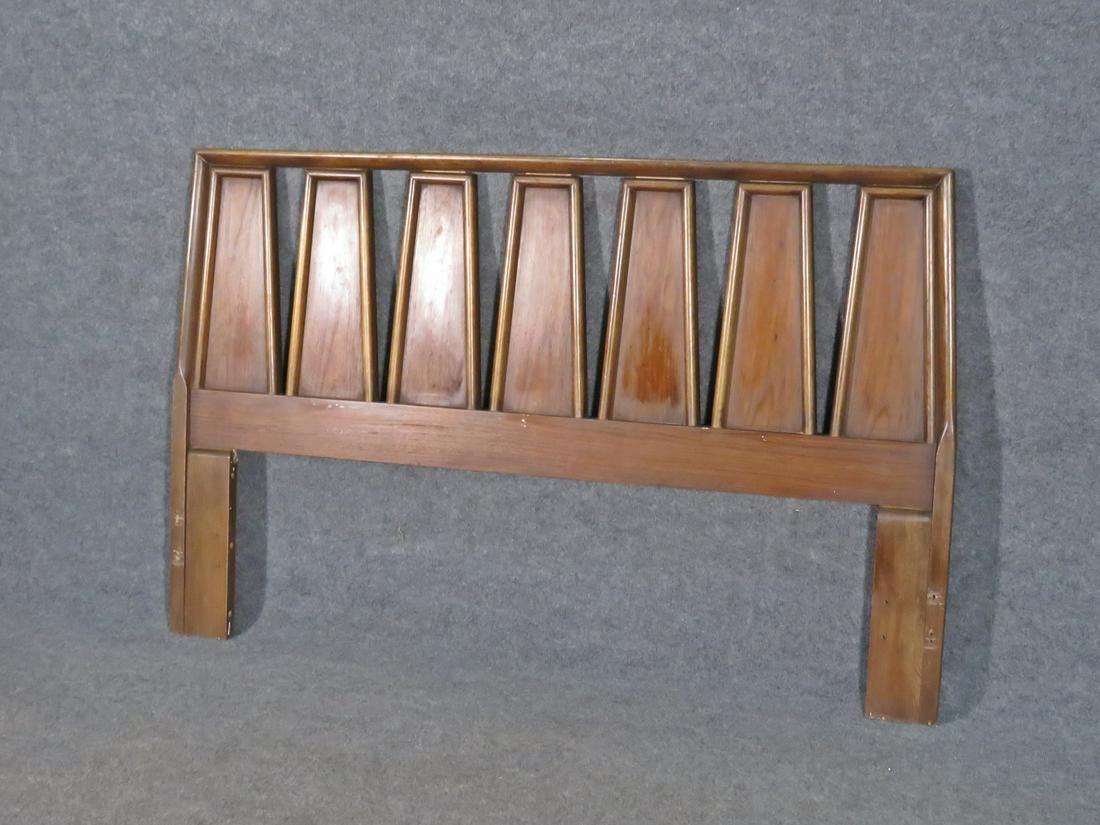 Sized for a full-sized bed, this vintage headboard by American of Martinsville combines an impressive design with rich walnut woodgrain for a timeless Mid-Century Modern look. Please confirm item location with seller (NY/NJ).