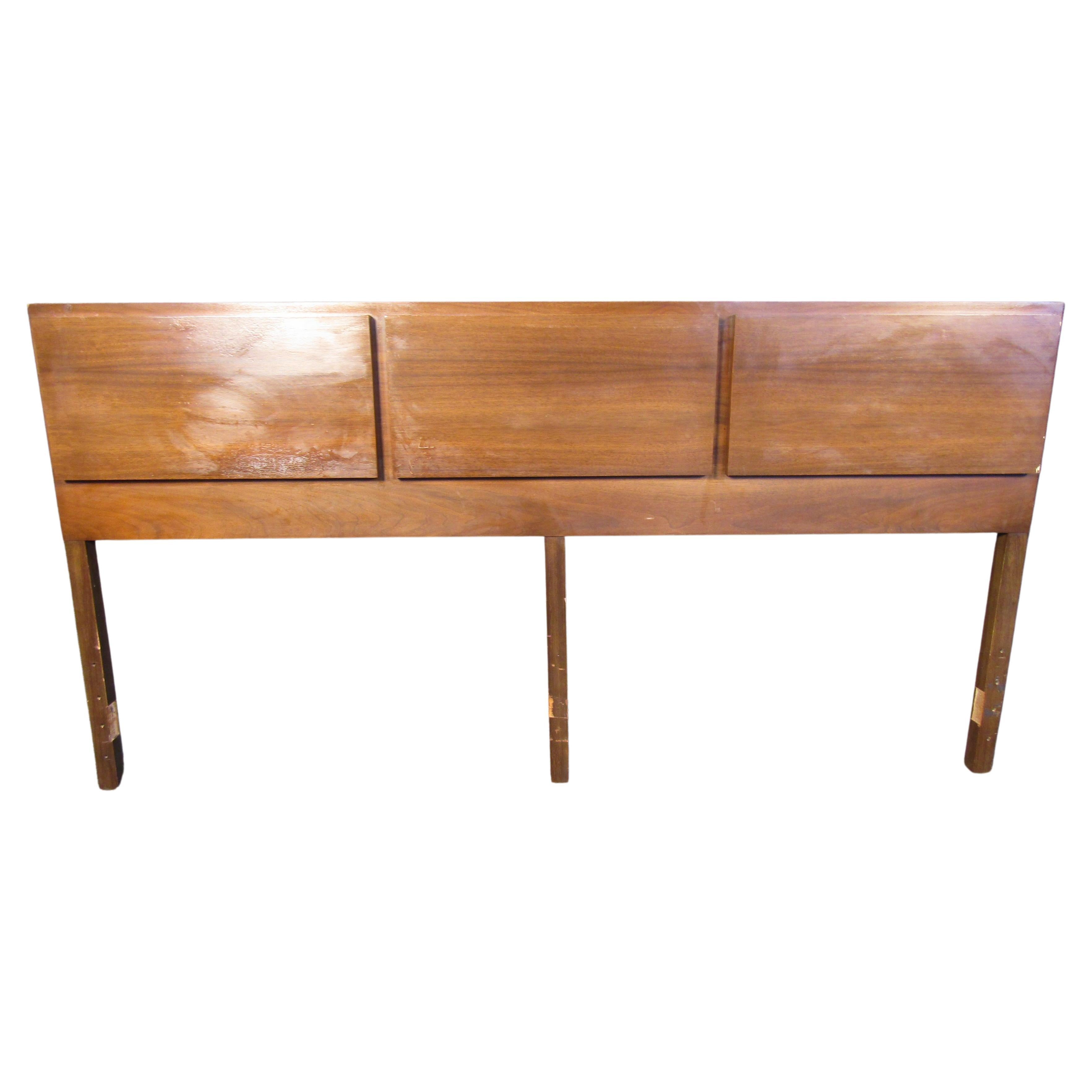 This large walnut headboard is perfect for adding Mid-Century Modern style to a bedroom. Please confirm item location with seller (NY/NJ).