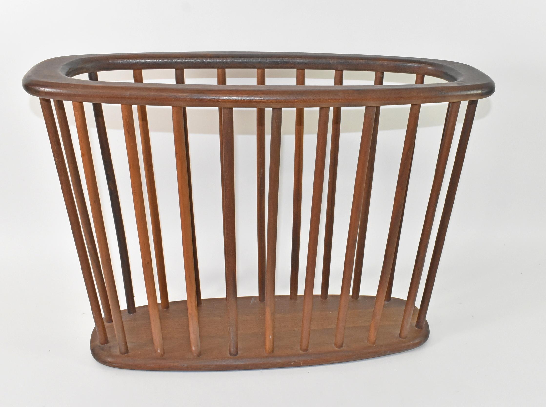 Vintage walnut mid century magazine rack. Circa 1960s. Original finish. Very good condition. 2 available, price reflects individual item. Dimensions: 21